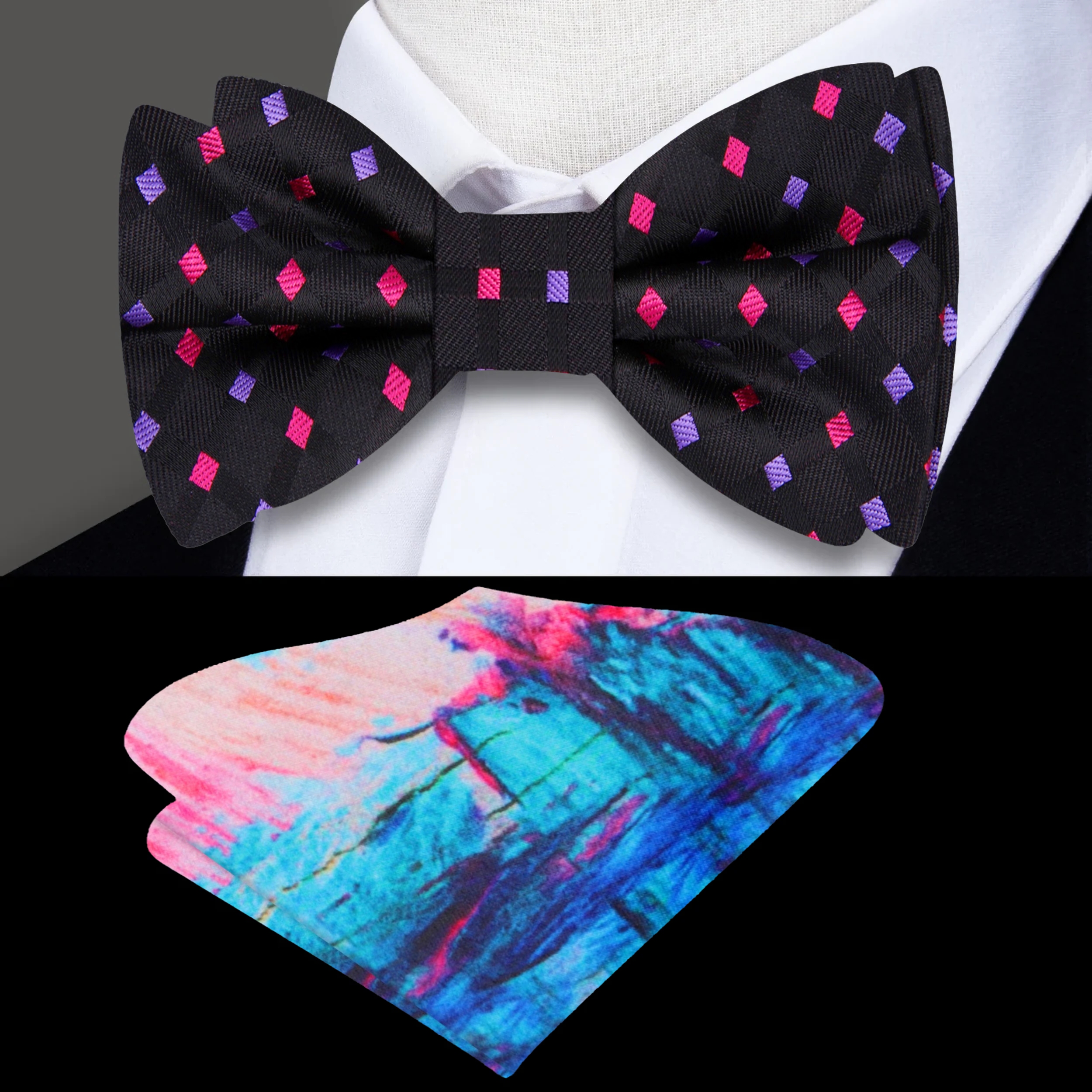 Elegant black silk bow tie with pink and purple geometric pattern, showcased on a mannequin.