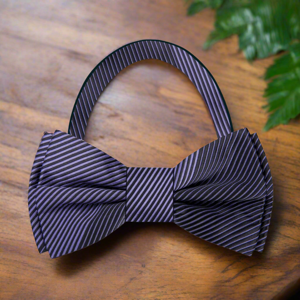 Front view of black and purple silk bow tie with wavy pattern for formal wear