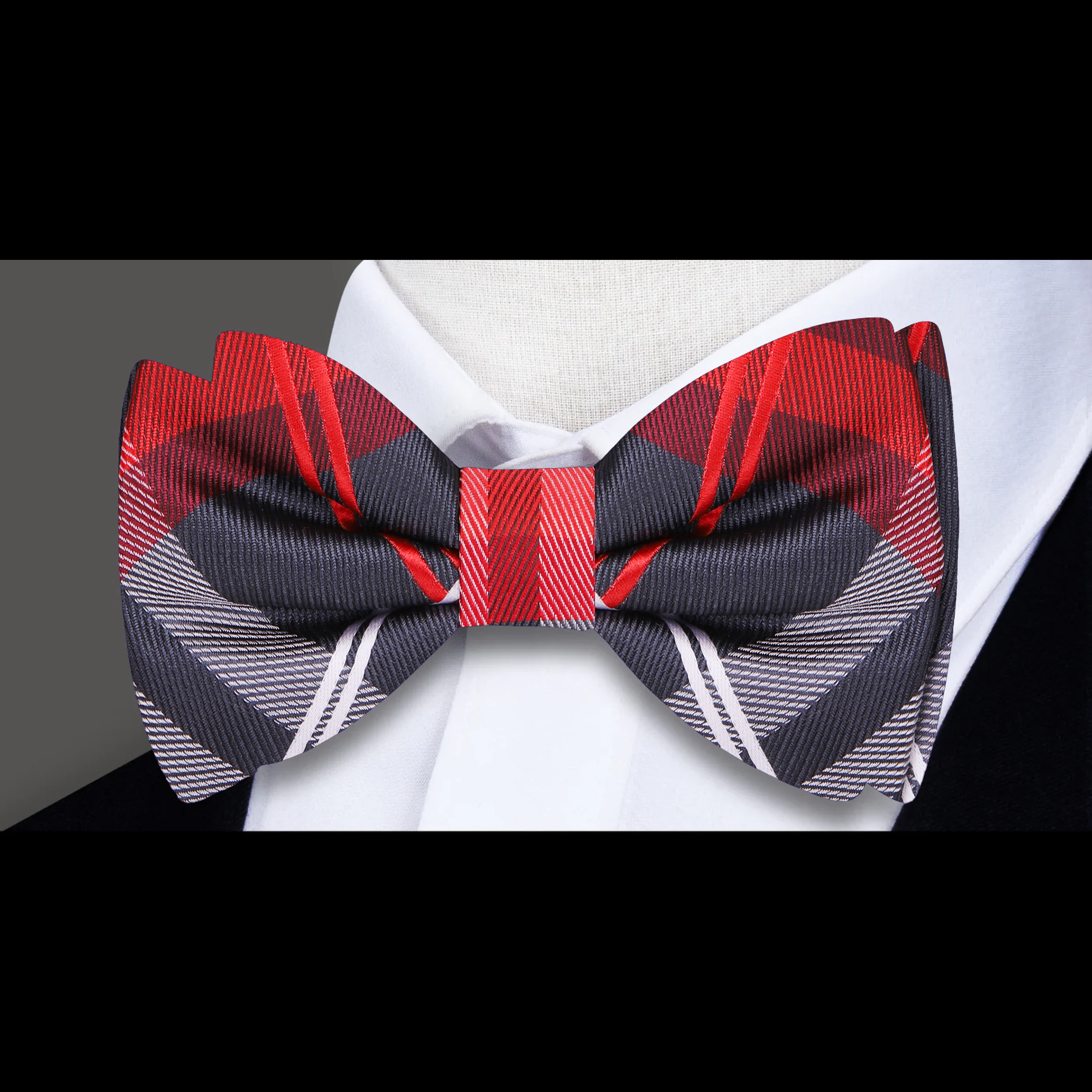 Group of friends wearing plaid bow ties at a casual wedding reception