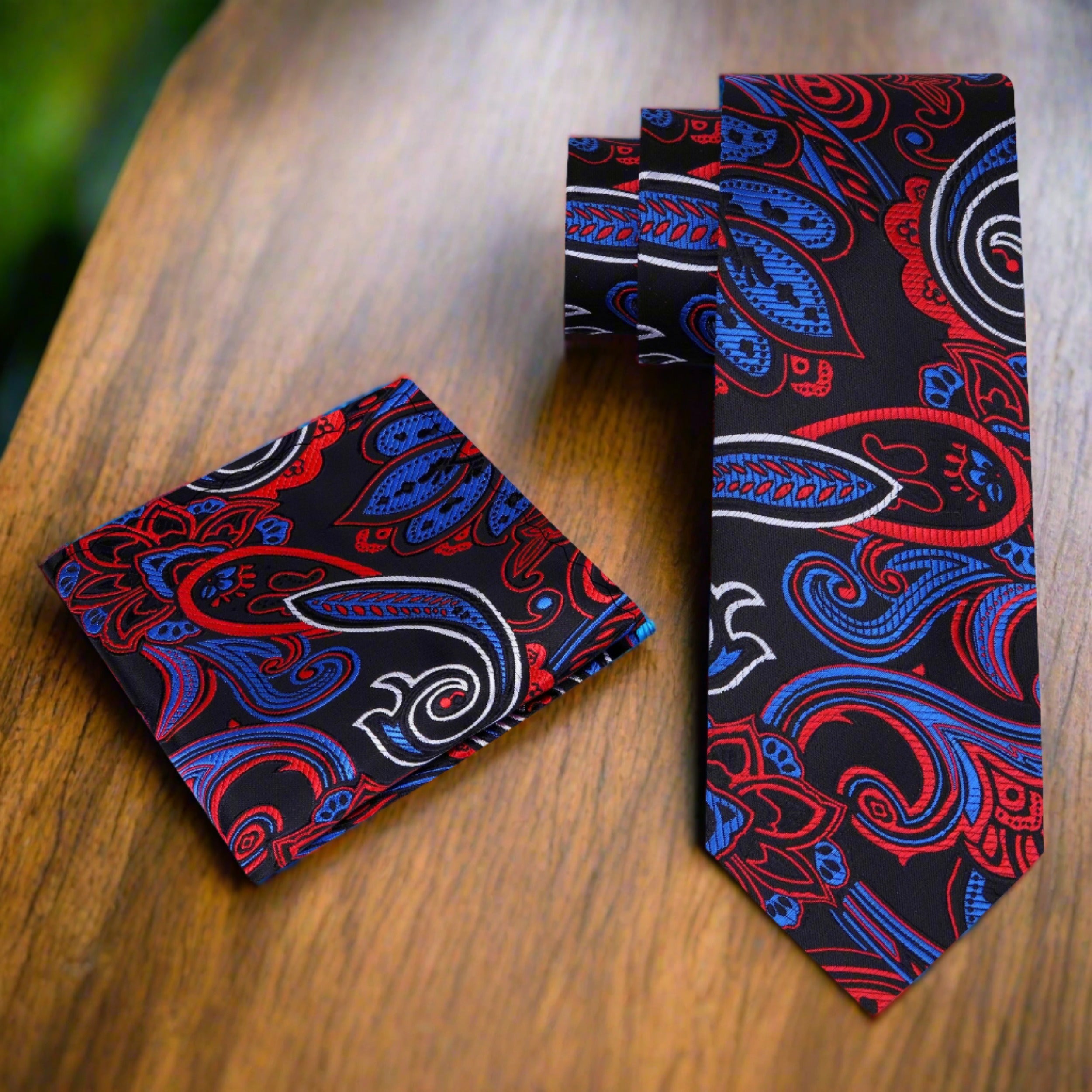 Close-up of intricate paisley pattern on a silk mens tie suitable for weddings