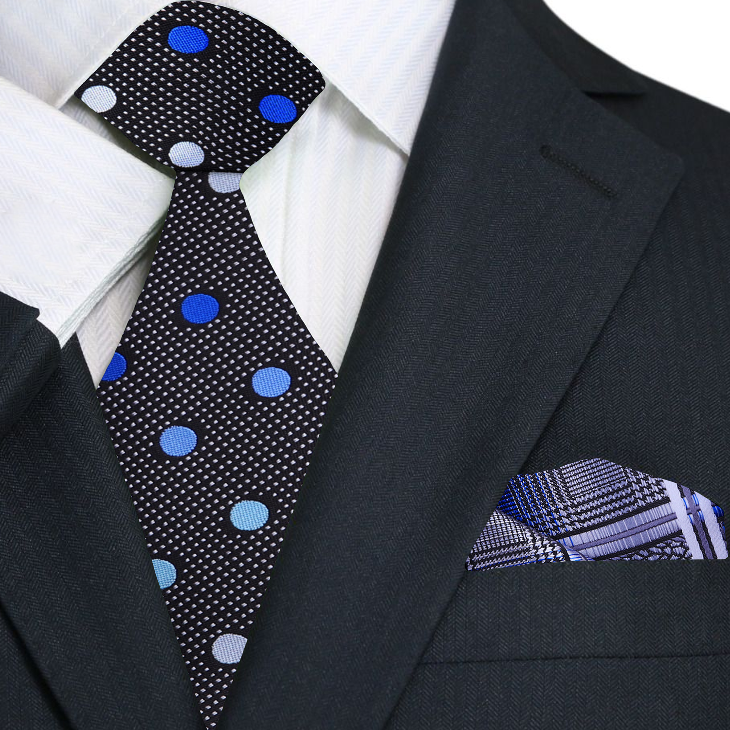 Man wearing a stylish silk necktie with a white shirt and navy suit