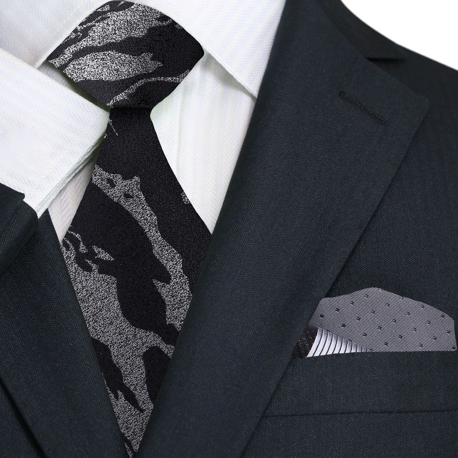 Close-up of onyx pattern silk necktie on a display stand