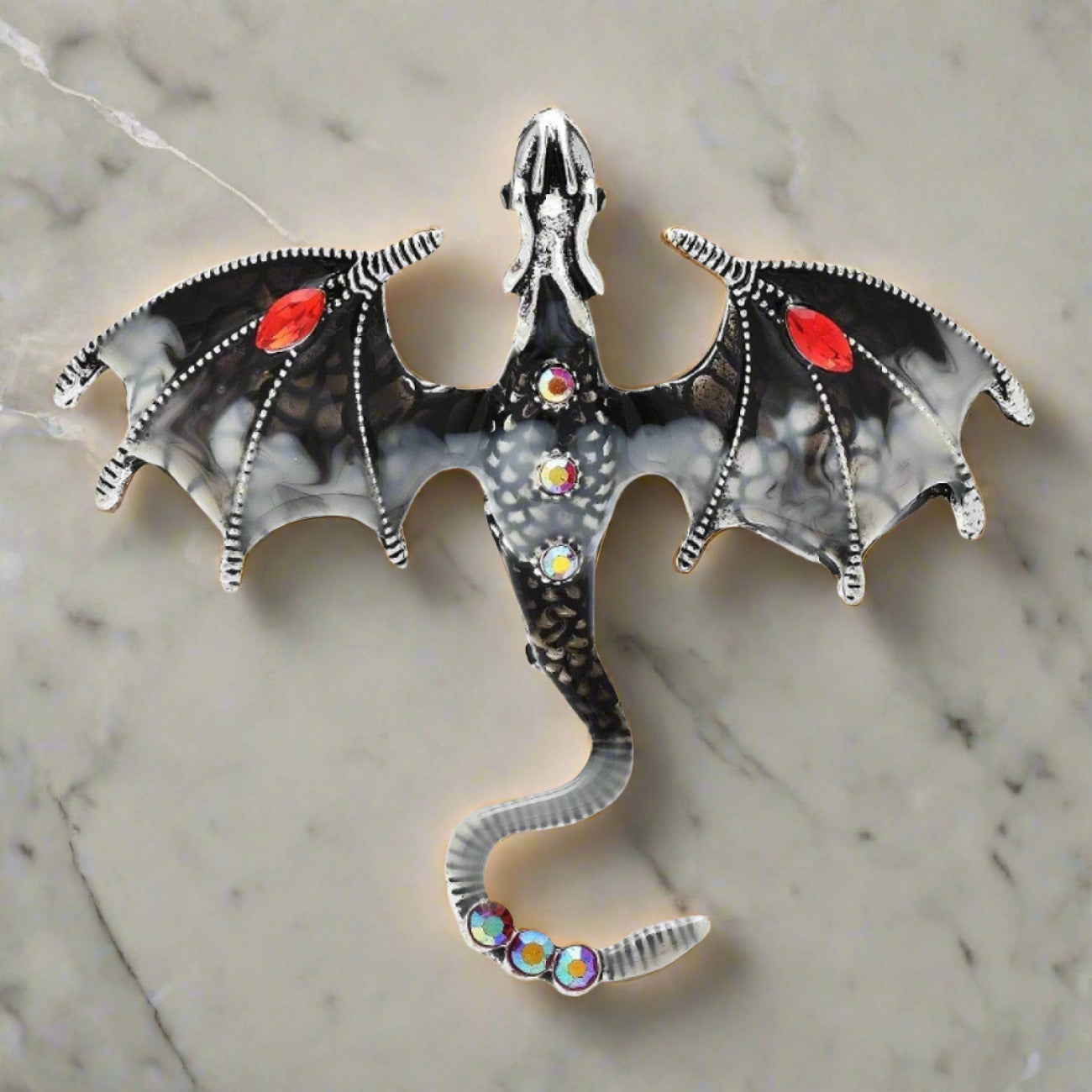 Angled view of the Majestic Dragon Lapel Pin, capturing its intricate details and vibrant colors.