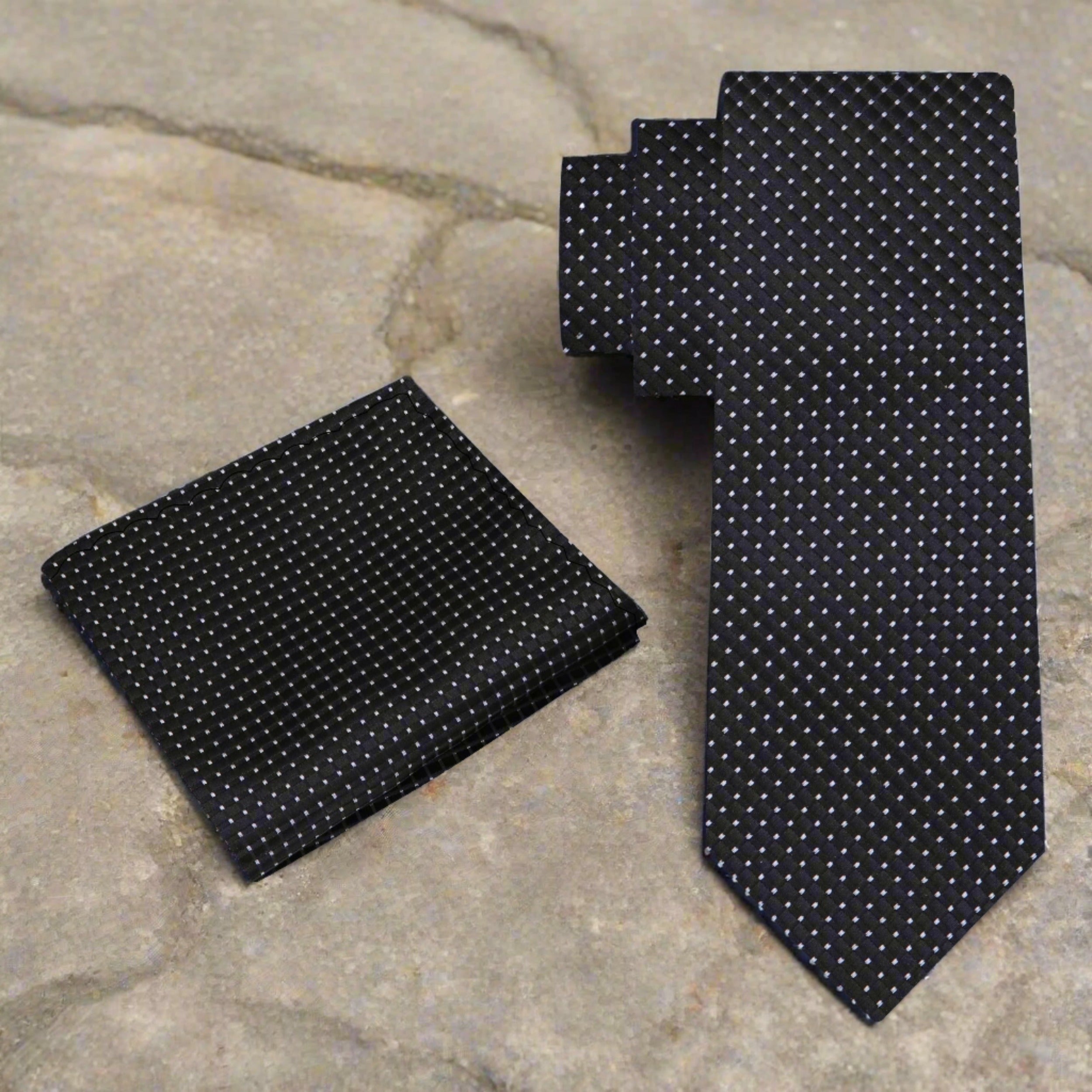 Man wearing a metallic geometric textured silk necktie at a wedding