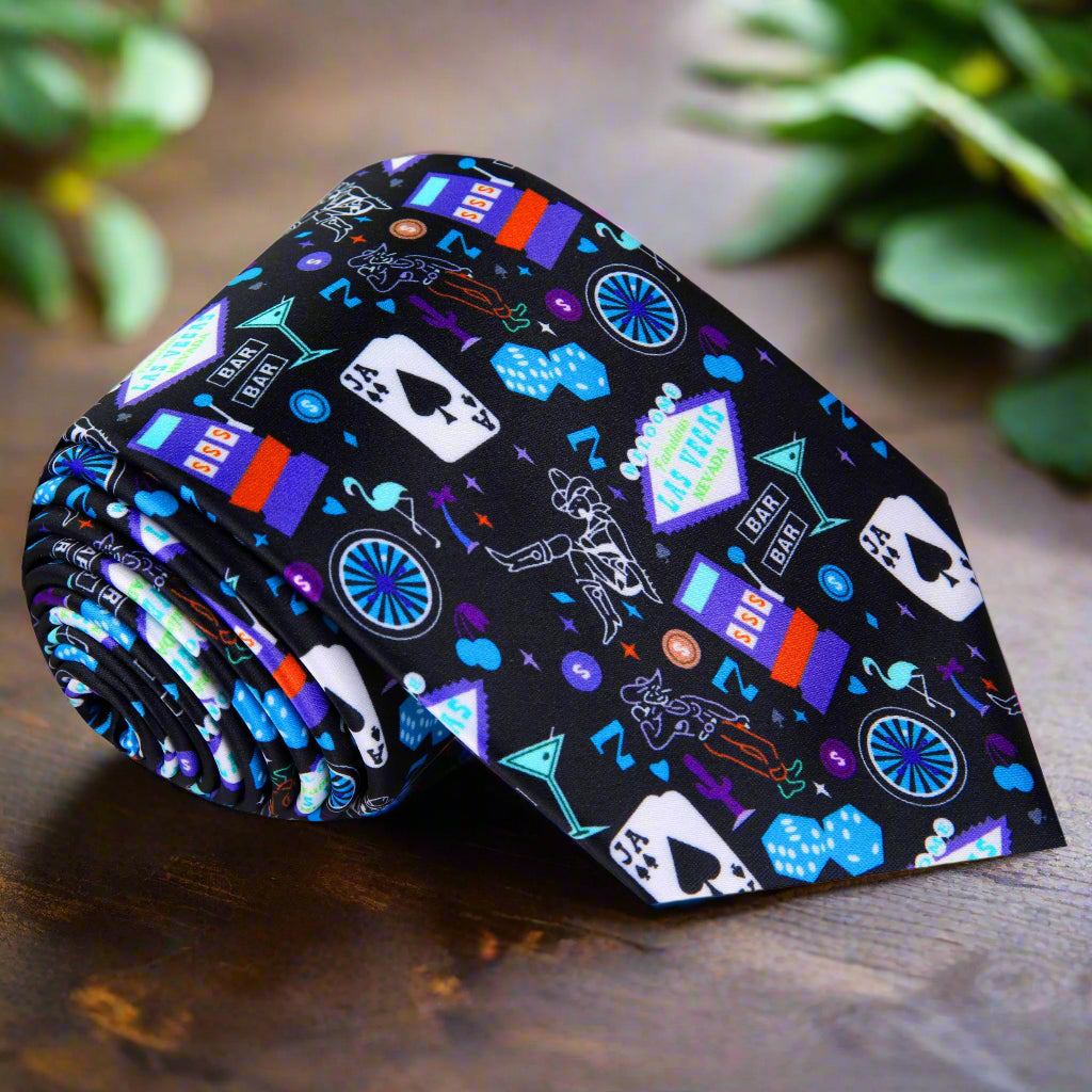 Close-up of vibrant Las Vegas theme necktie with neon colors and iconic symbols