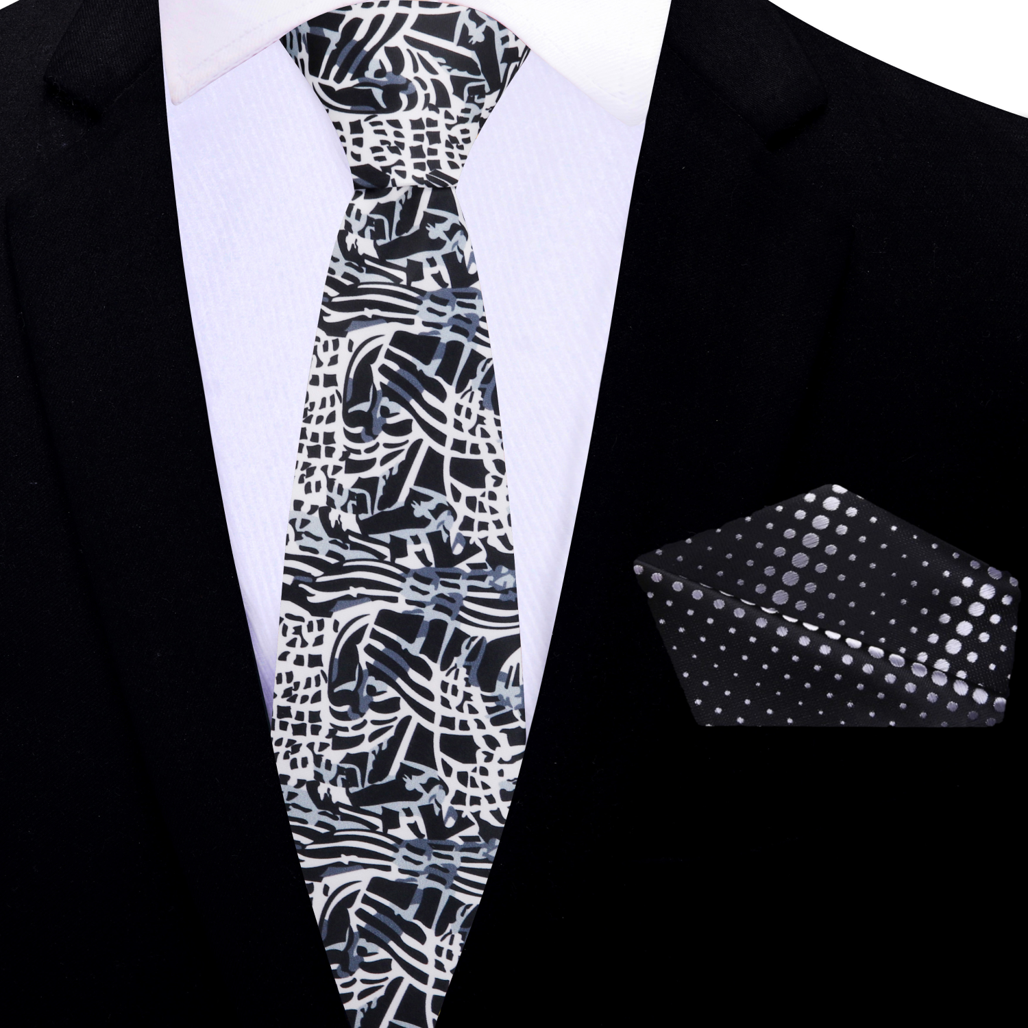 Close-up of the abstract silk tie showing intricate pattern details.