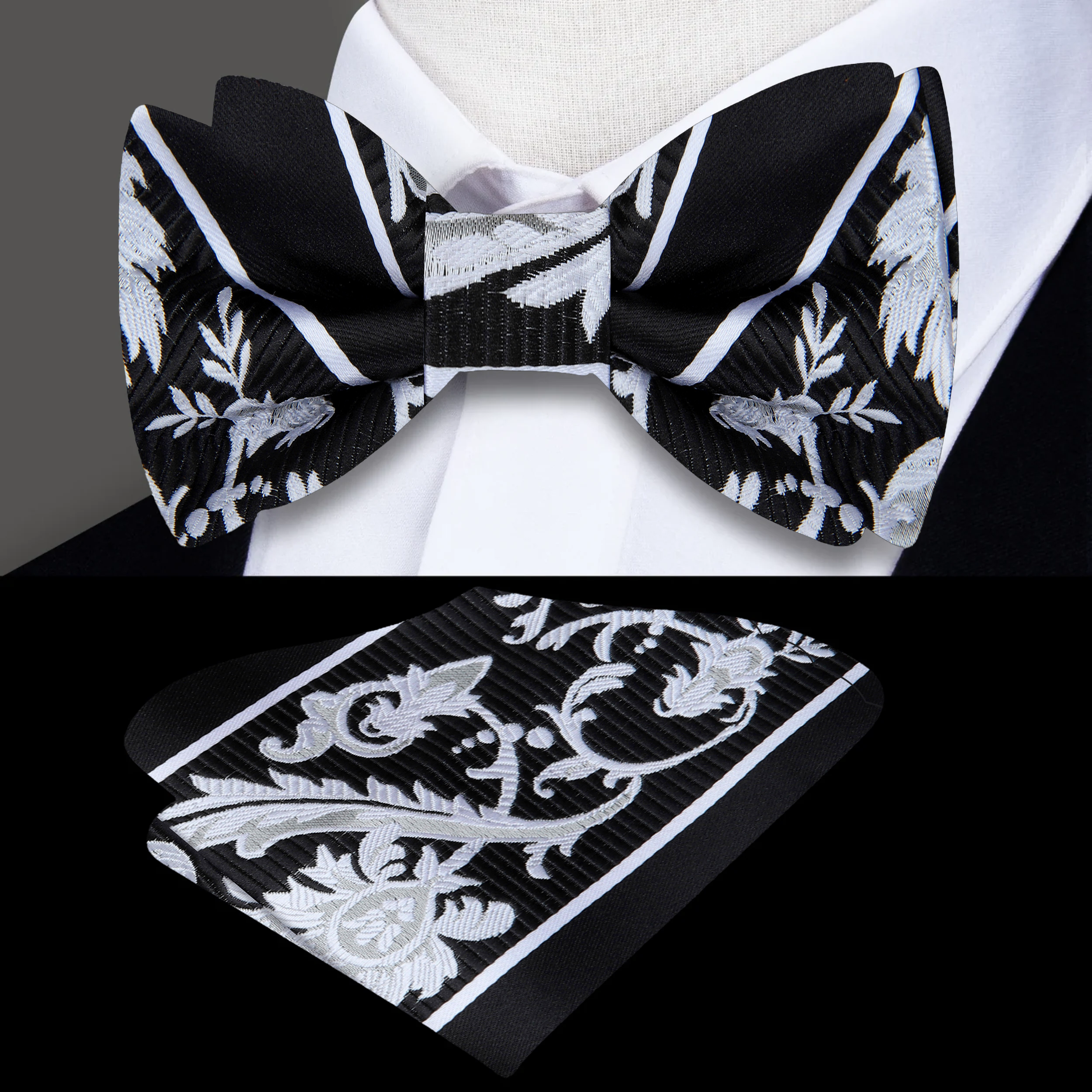 Close-up of black floral bow tie with red accents for formal wear