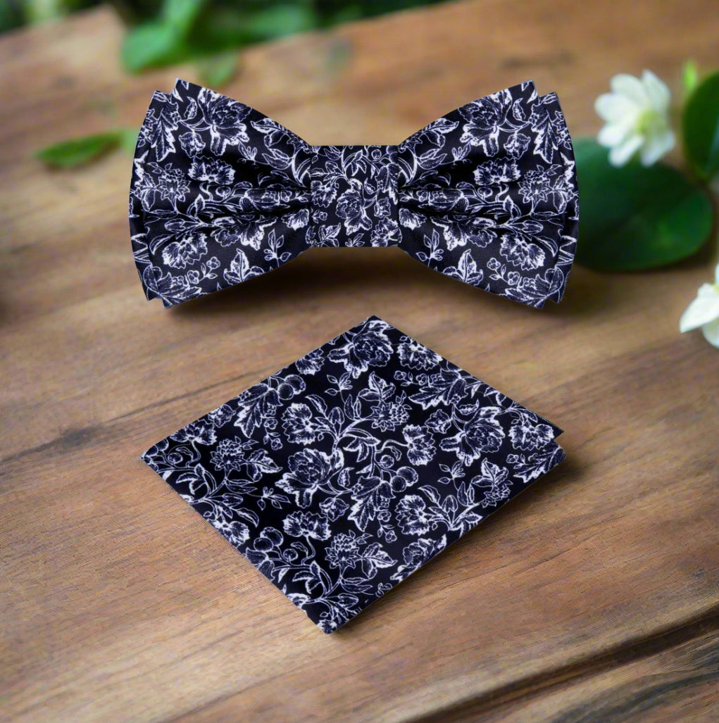 Elegant black silk bow tie with intricate filigree design, perfect for weddings
