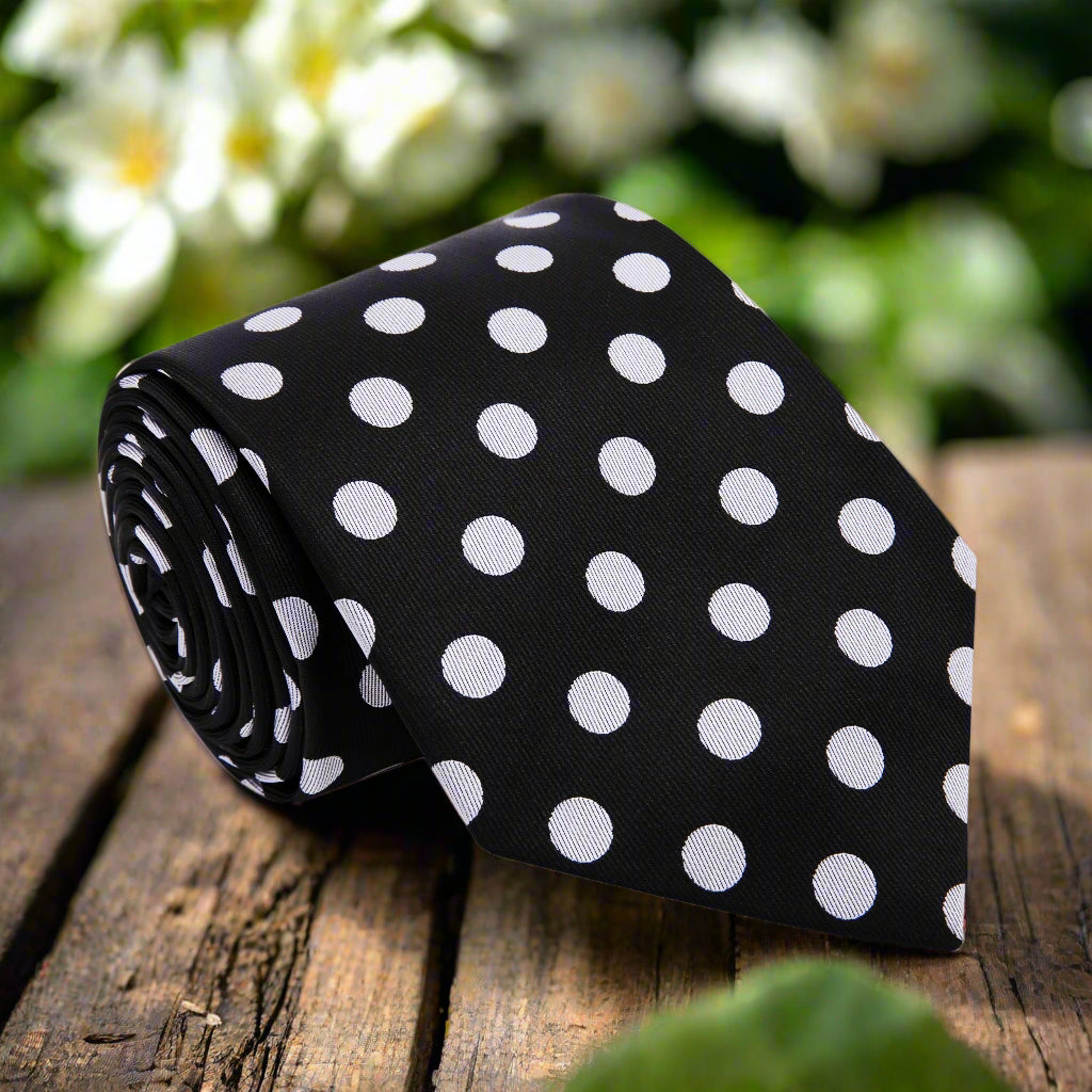 Polka dot silk tie styled with a white dress shirt for formal events