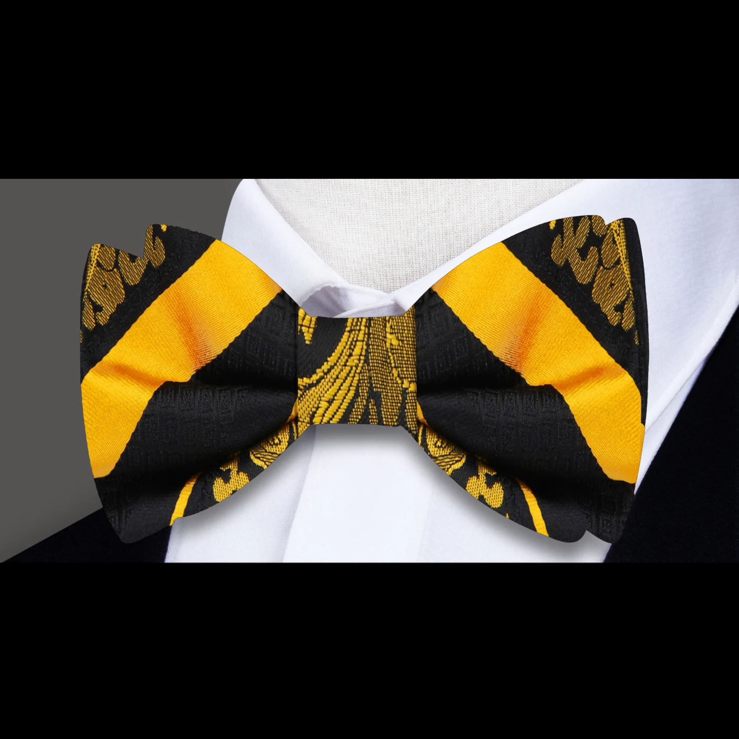 Child wearing the pre-tied bow tie with pocket square at a formal event