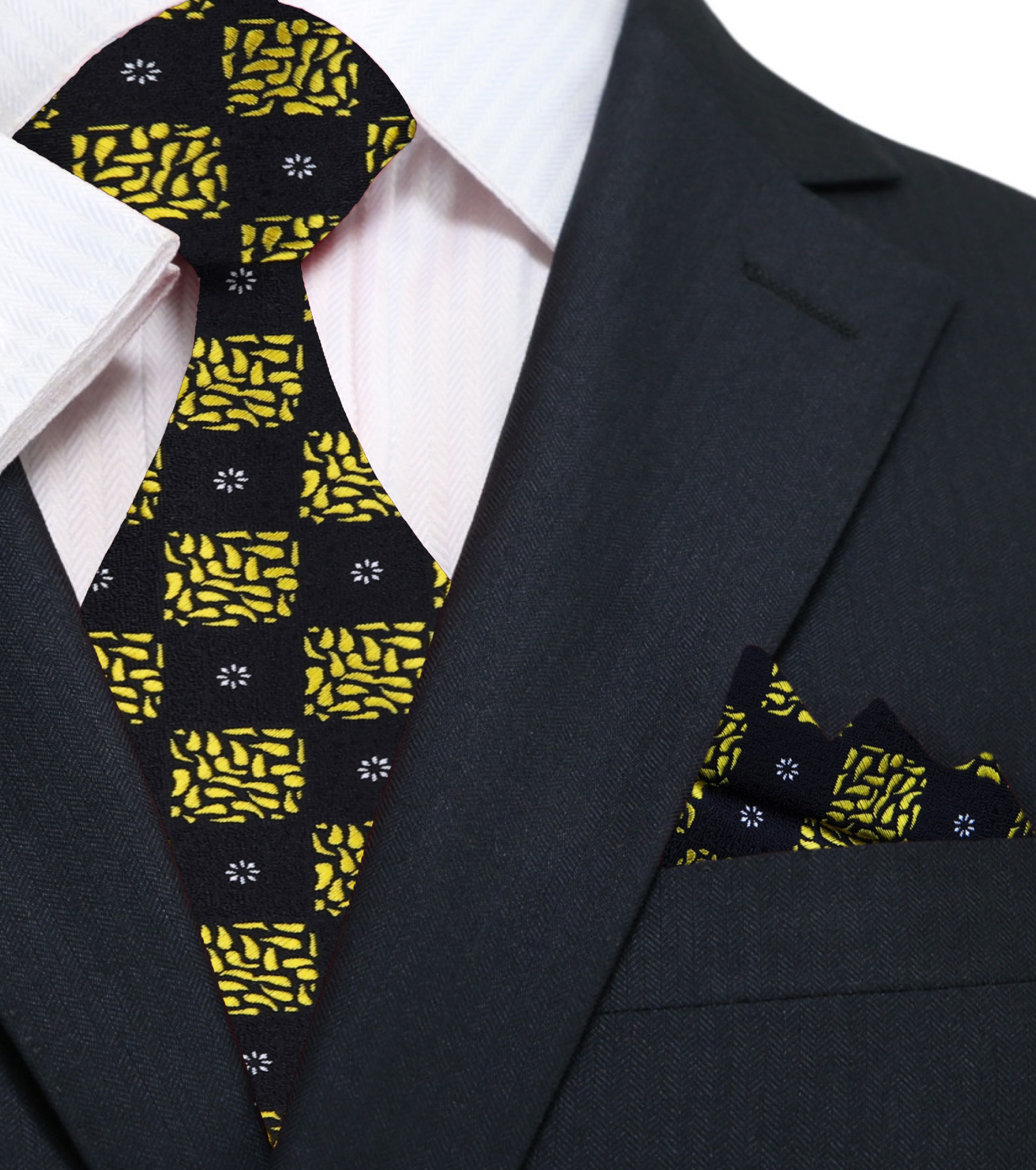 Model wearing Ulysses luxury geometric tie with white dress shirt at formal evening reception