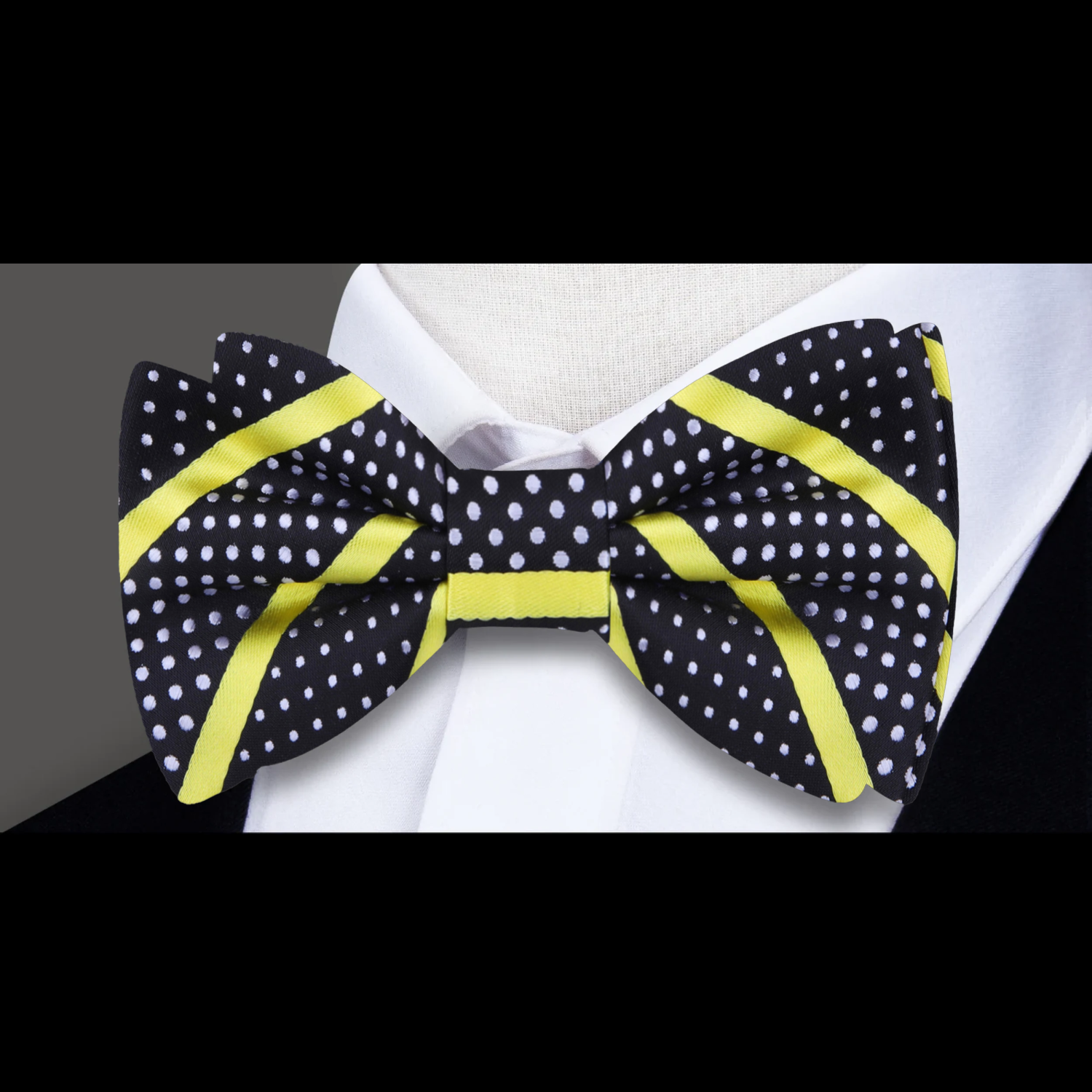 Chic striped polka dot bow tie in vibrant colors, styled with a white dress shirt.
