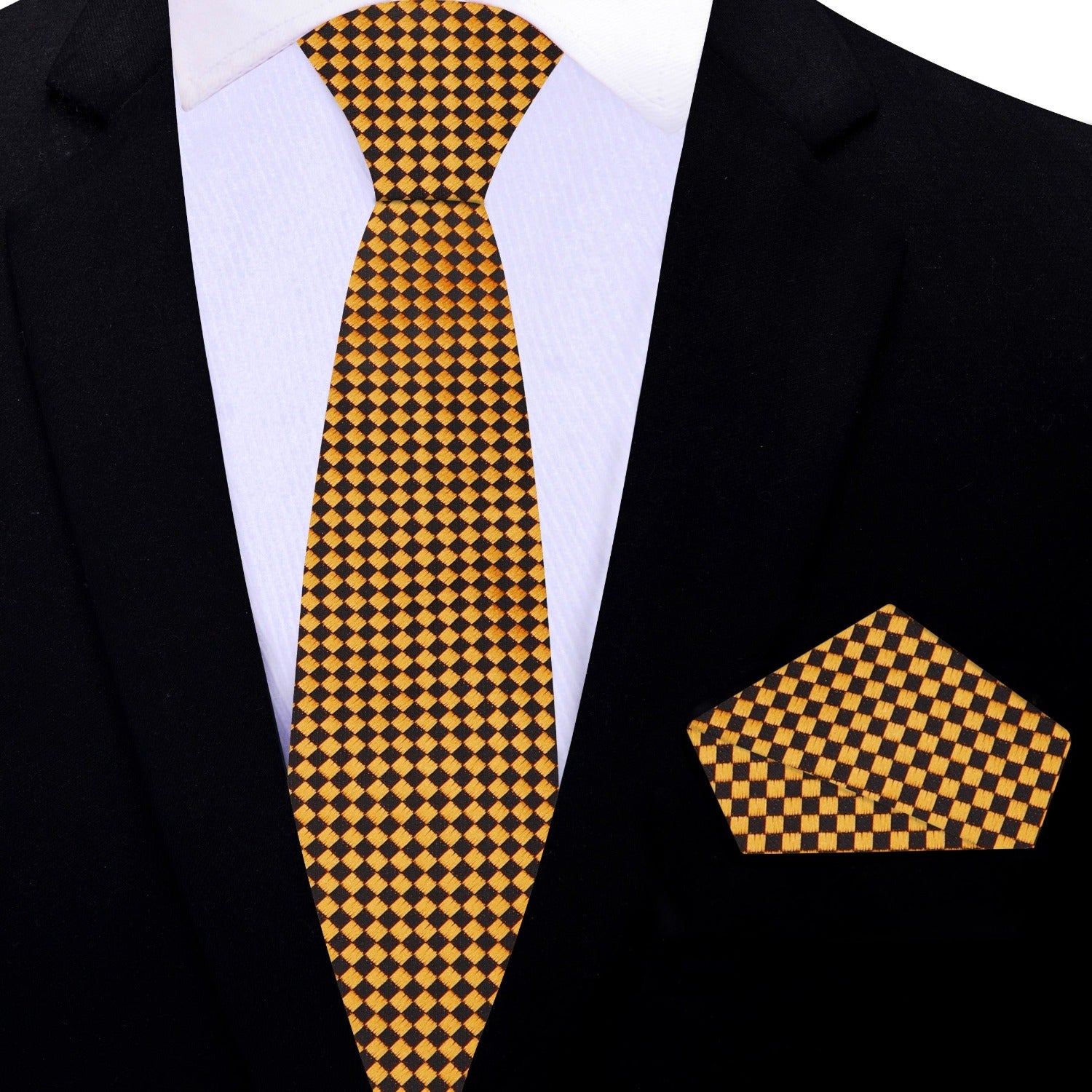 Model wearing the Noble Gold and Black Geometric Necktie with a white dress shirt at a formal event.