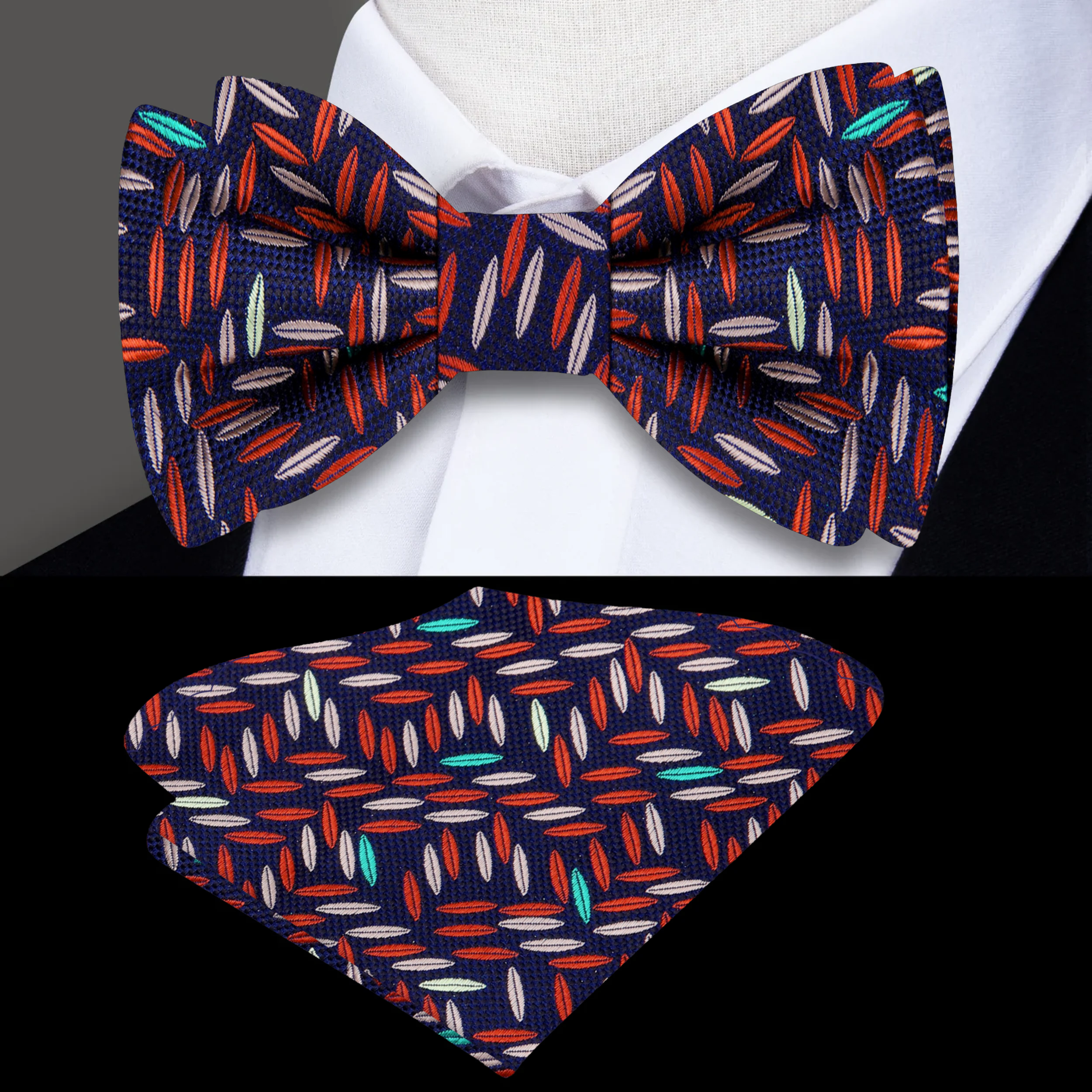 Close-up of the blackened blue bow tie paired with a light blue shirt, highlighting its stylish contrast.