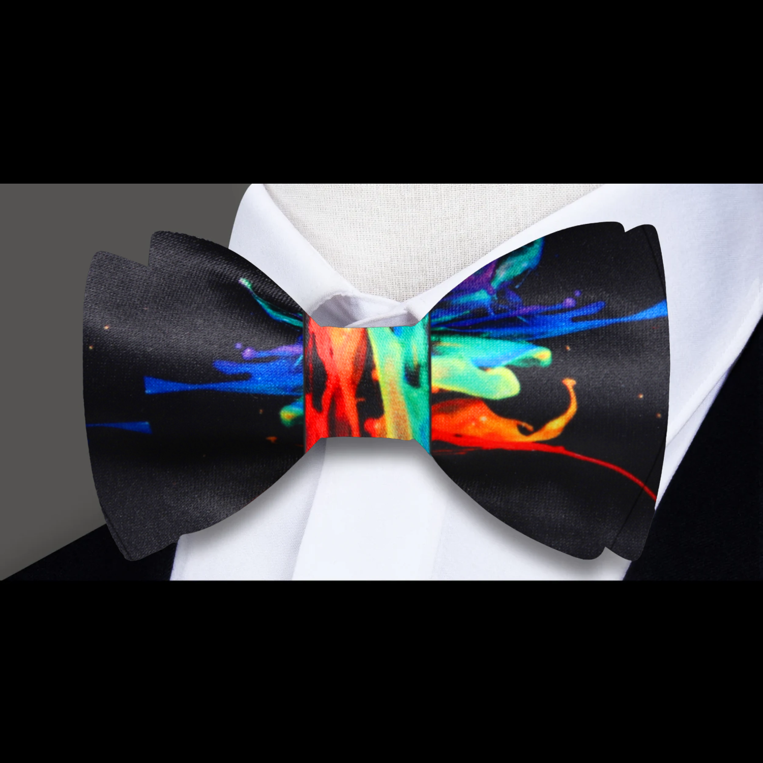 Front view of multicolor silk bow tie on a mannequin, showcasing the artistic design