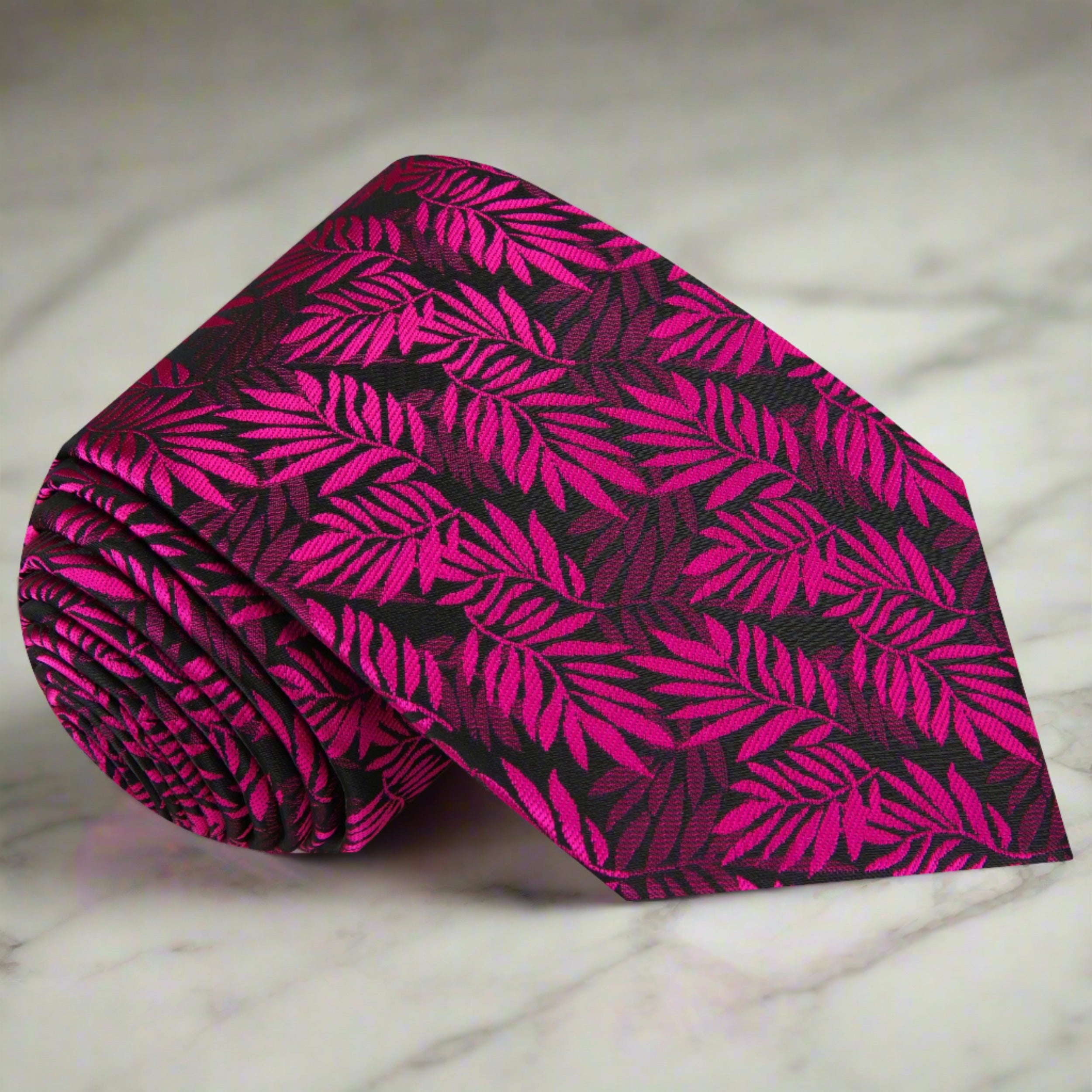 Silk necktie with red, pink, and black leaves pattern for weddings and formal events