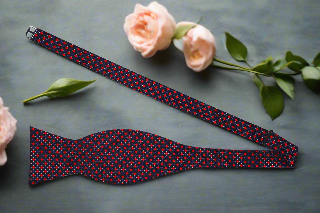 Garriston silk check bow tie in black, red, and purple, showcasing stylish design for formal events.