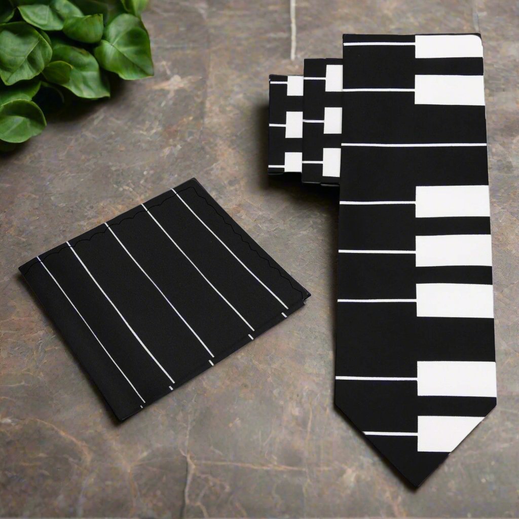 Elegant silk music tie with piano keys pattern displayed flat for style presentation