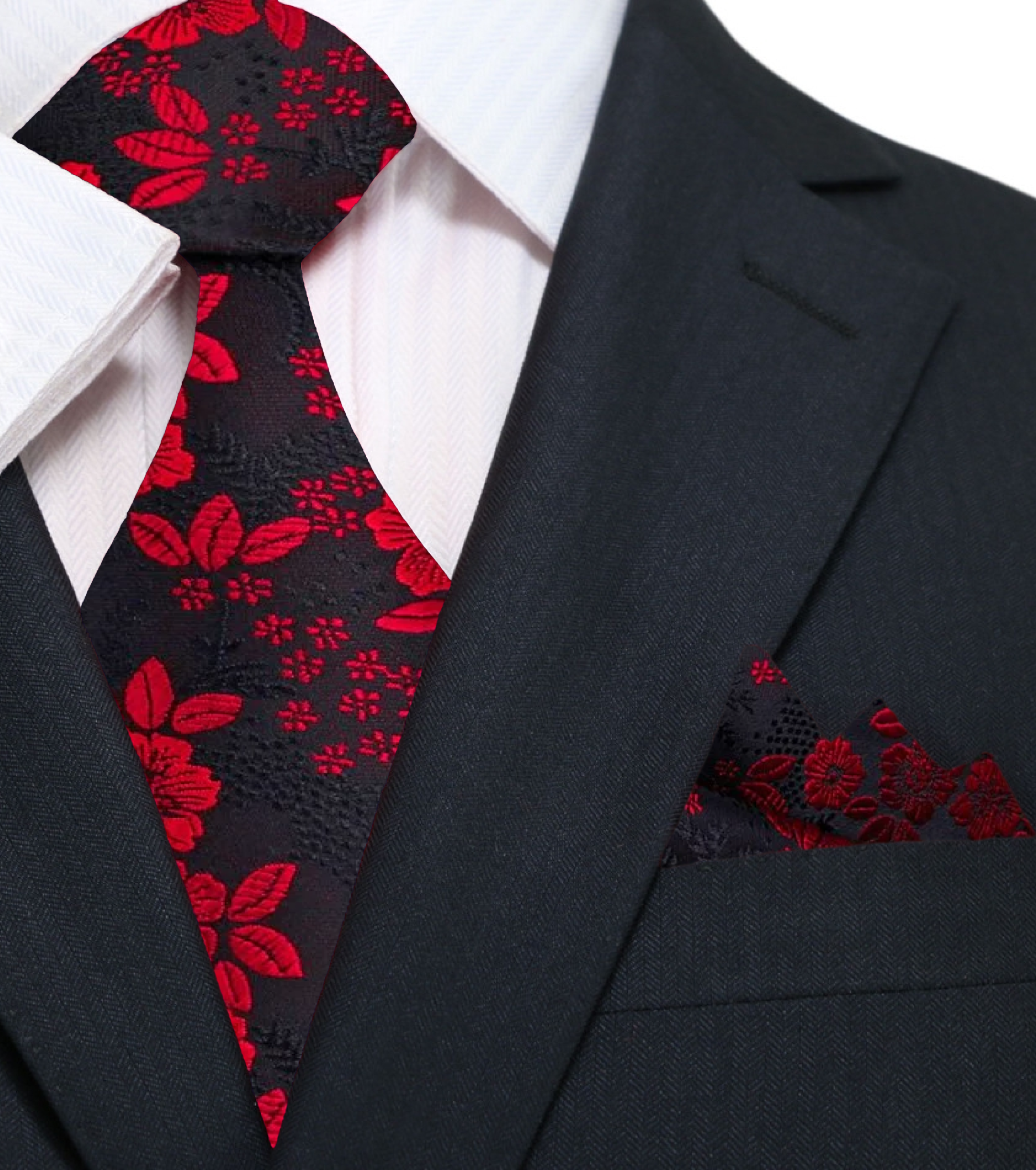 Man wearing a floral necktie with a navy suit at a wedding