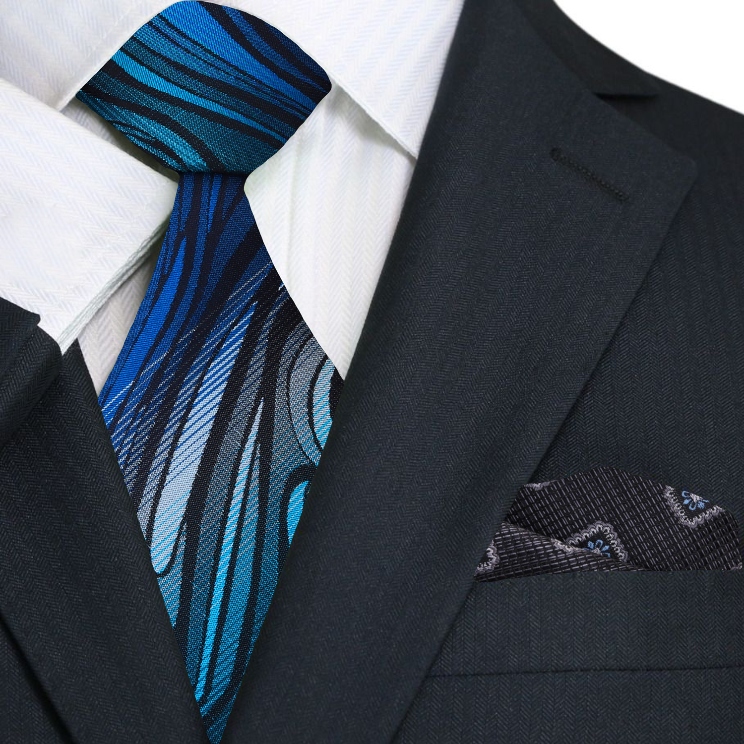 Blue abstract fire necktie paired with a charcoal grey suit for a formal event.