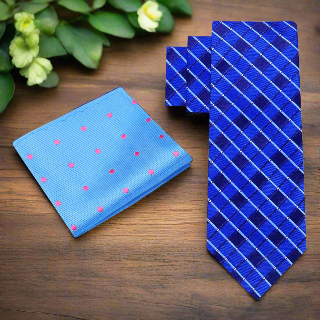 Close-up view of blue geometric necktie showcasing intricate pattern.