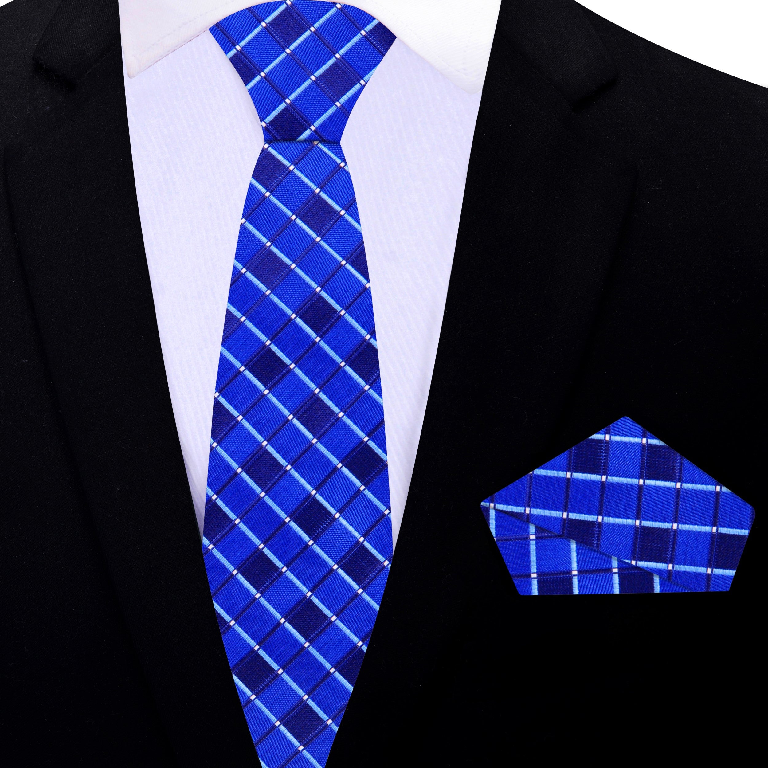 Blue necktie displayed against a navy suit background, highlighting color harmony.