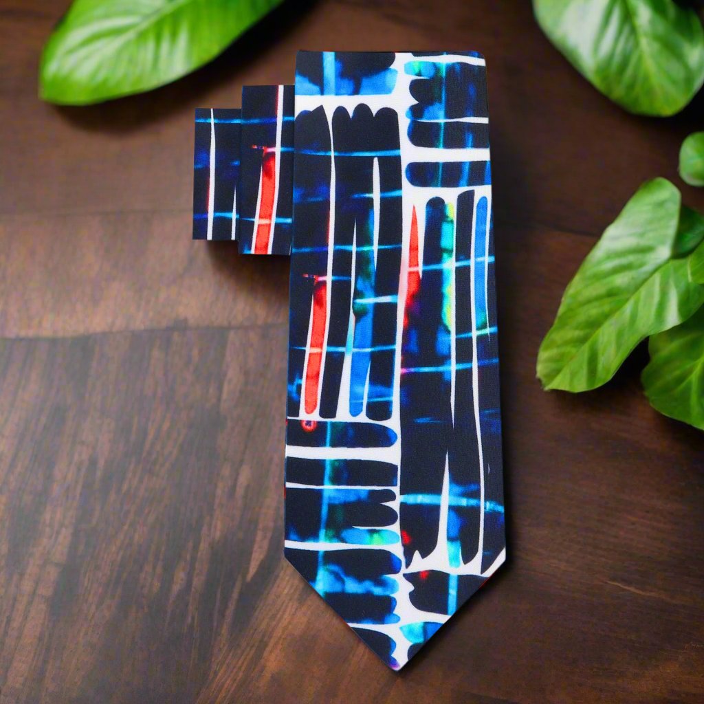 Model wearing modern abstract silk tie at an art exhibit