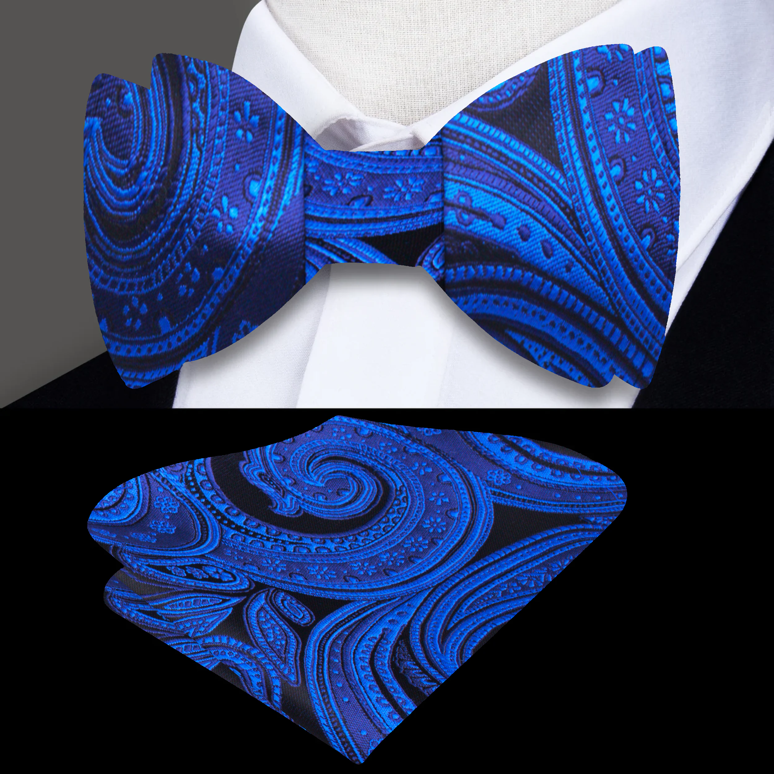 Elegant black and blue paisley self-tie bow tie displayed on a crisp white shirt.
