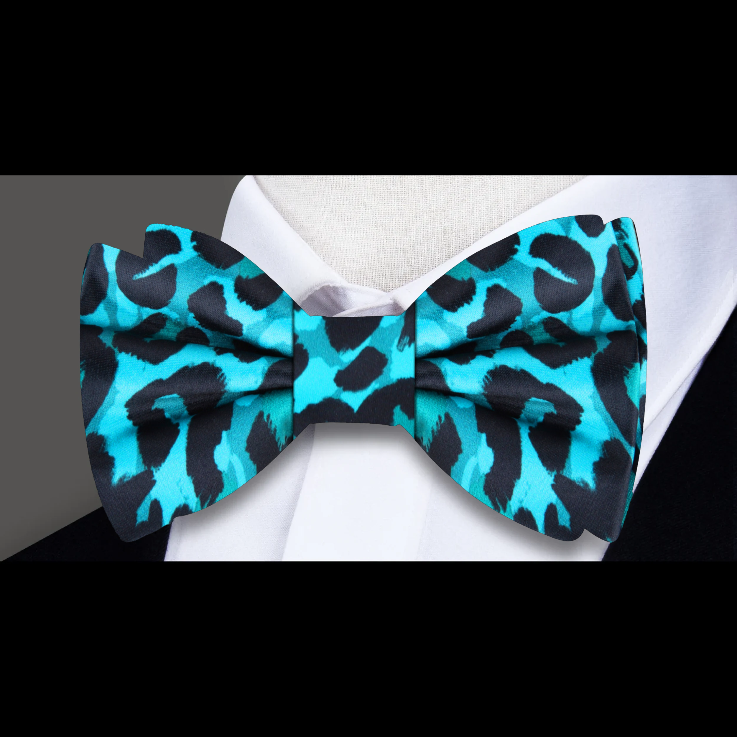 Mens bow tie featuring a bold cheetah print, perfect for weddings and parties