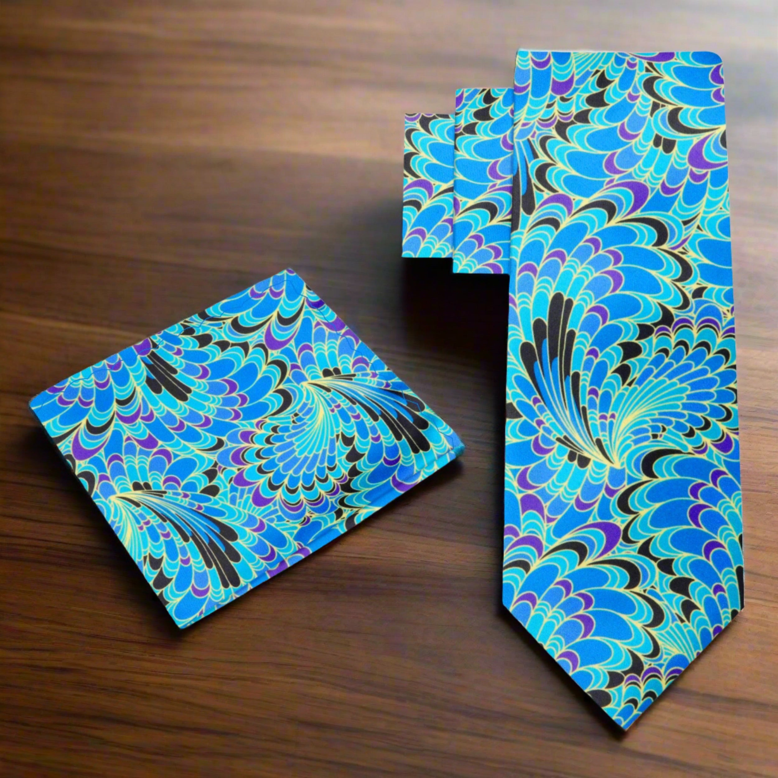 Man wearing a high-quality silk tie with peacock design paired with a white dress shirt