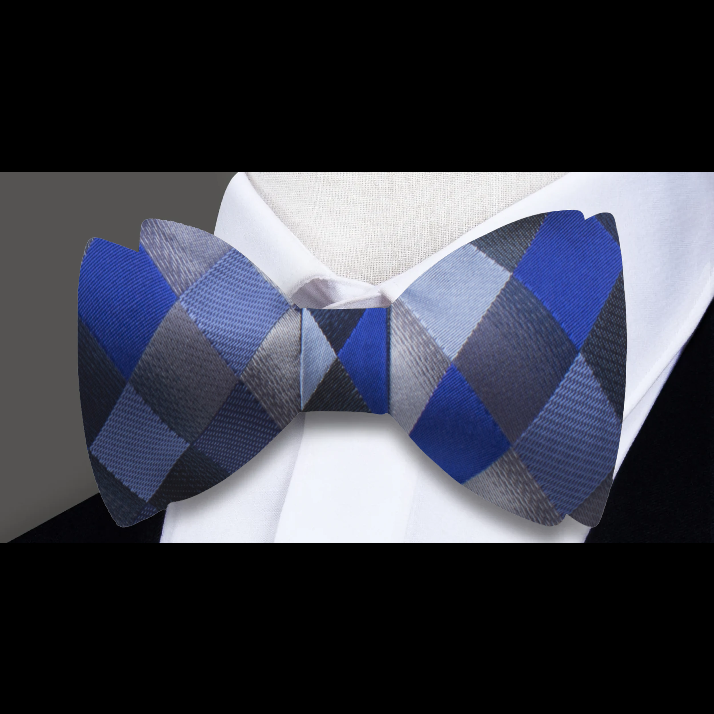Front view of a geometric silk bow tie in pastel colors, suitable for weddings