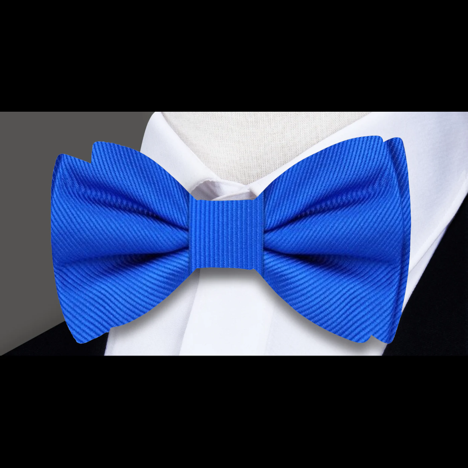 Matching pocket square with a navy blue bow tie, ideal for business meetings.