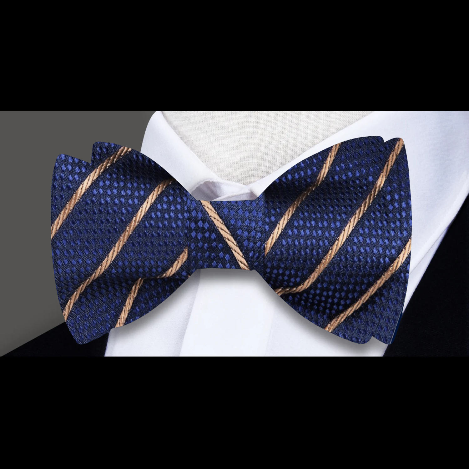 Close-up of a classic pinstripe silk bow tie for weddings and business occasions