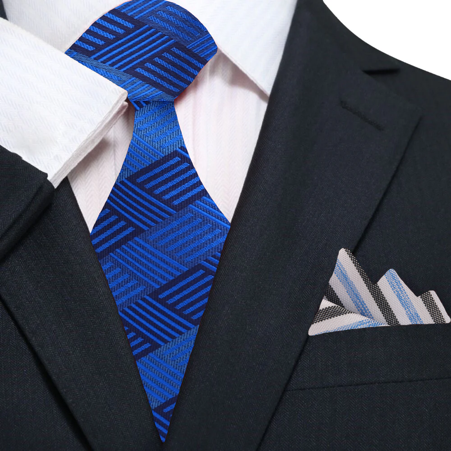 Front view of geometric silk necktie in deep blue, styled with white shirt and navy suit