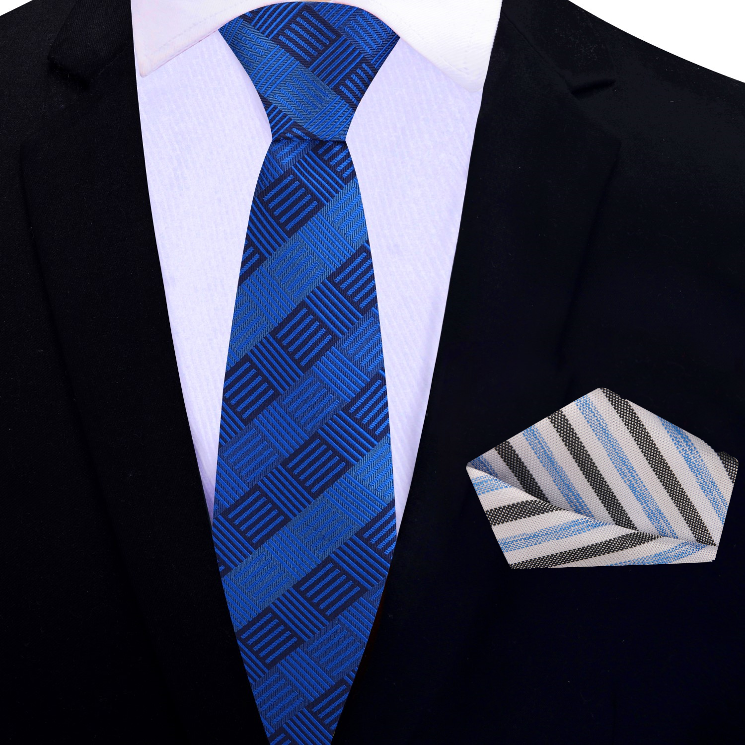 Close-up angle showing the textured pattern of geometric blocks on the silk necktie