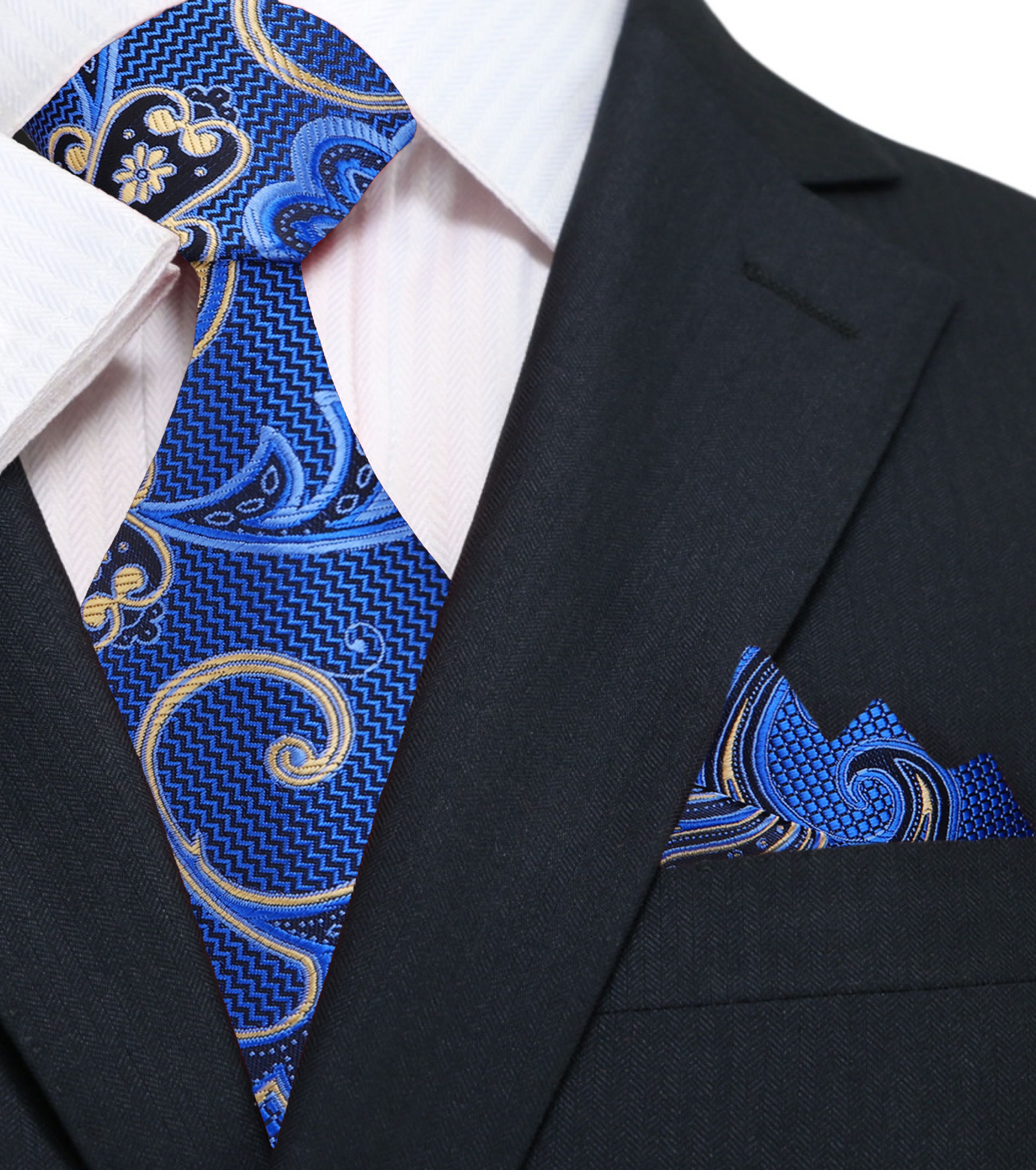 Blue paisley silk necktie paired with a light grey suit, perfect for weddings.