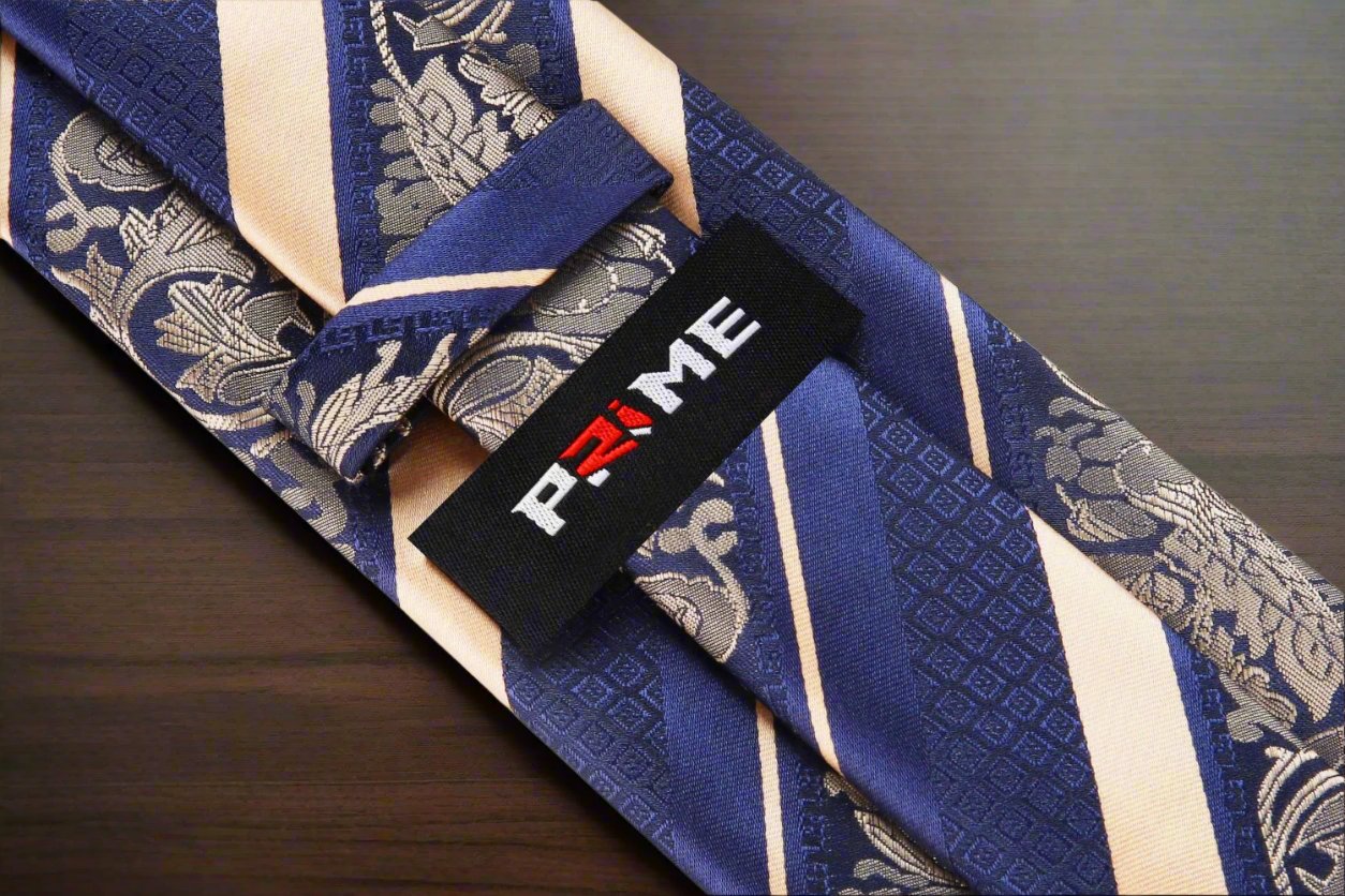 Close-up of the detailed floral and stripe pattern on the silk tie