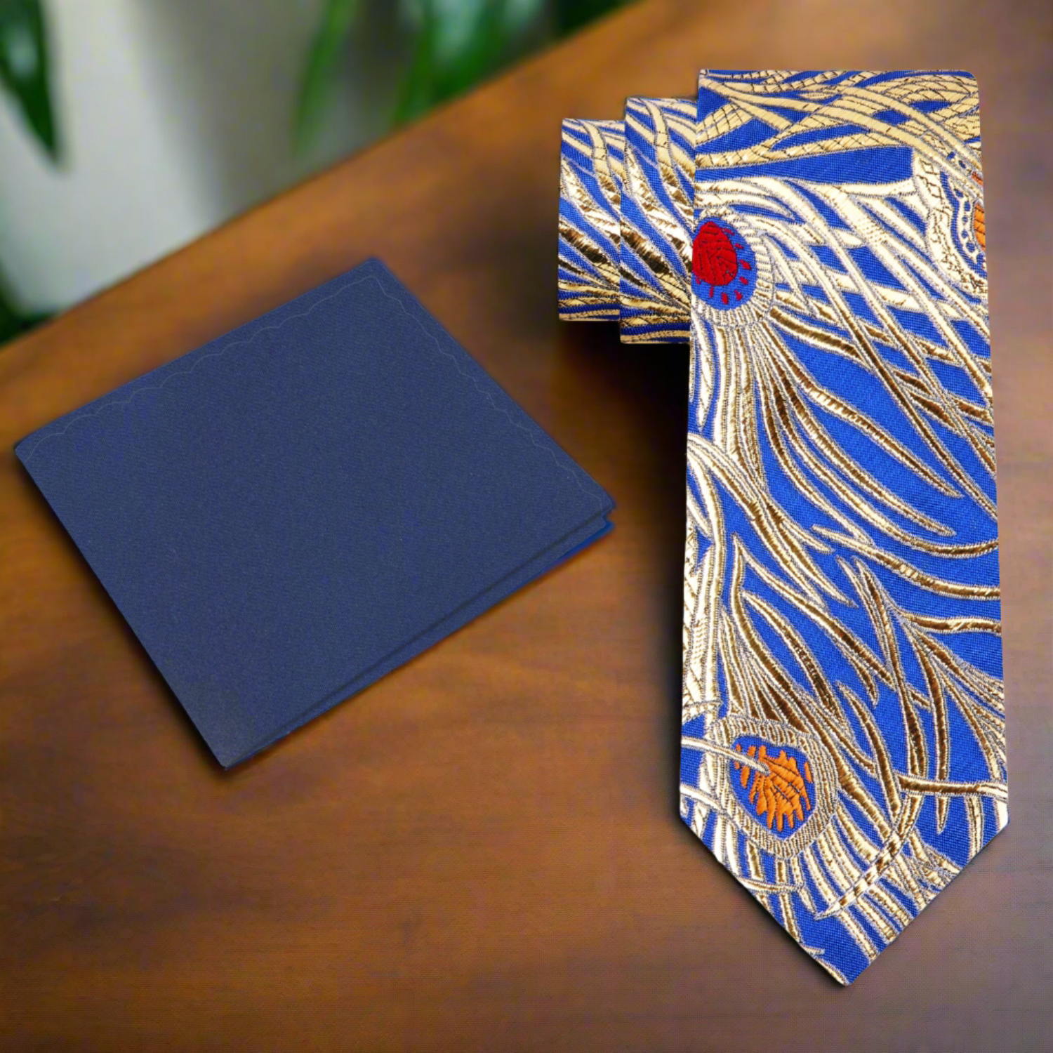 Model showcasing the Royal Peacock Feather silk necktie paired with a white dress shirt and navy blue suit.