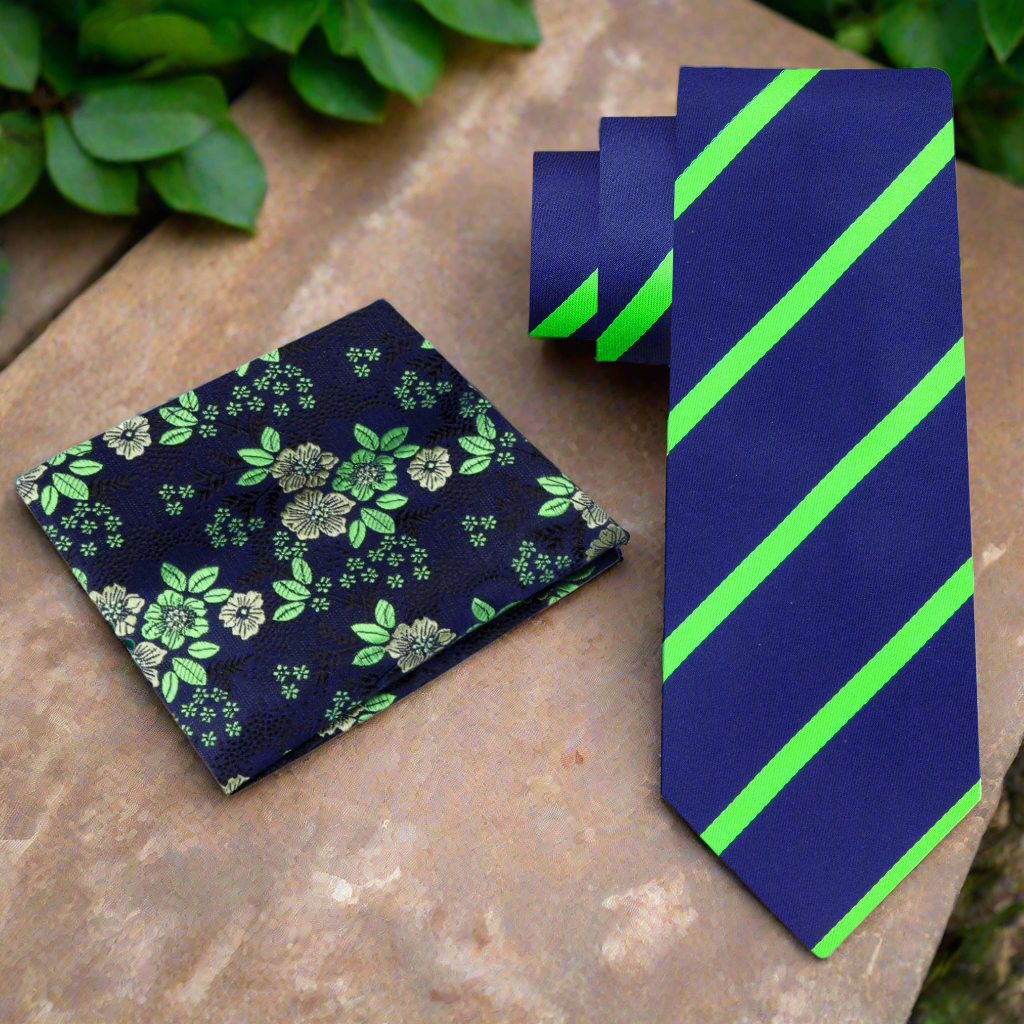 Dark blue and bright green striped necktie styled with a white dress shirt for formal events