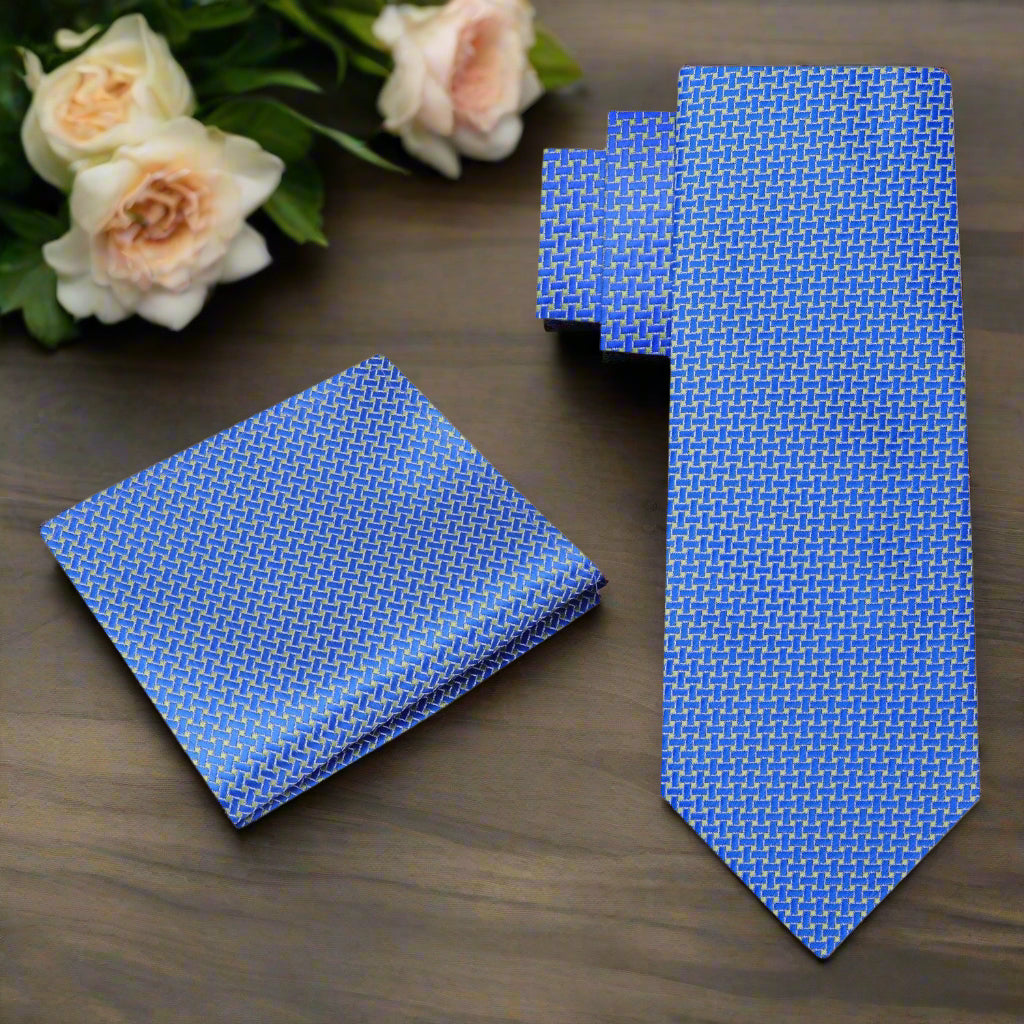Close-up of the blue green silk tie showcasing the crosshatch pattern