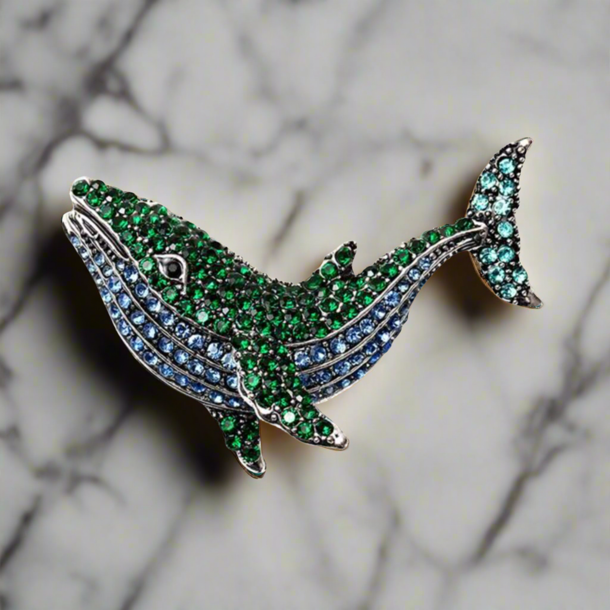Close-up of a gemstone exotic animal pin with vibrant colors, ideal for fashion accessories and gifts
