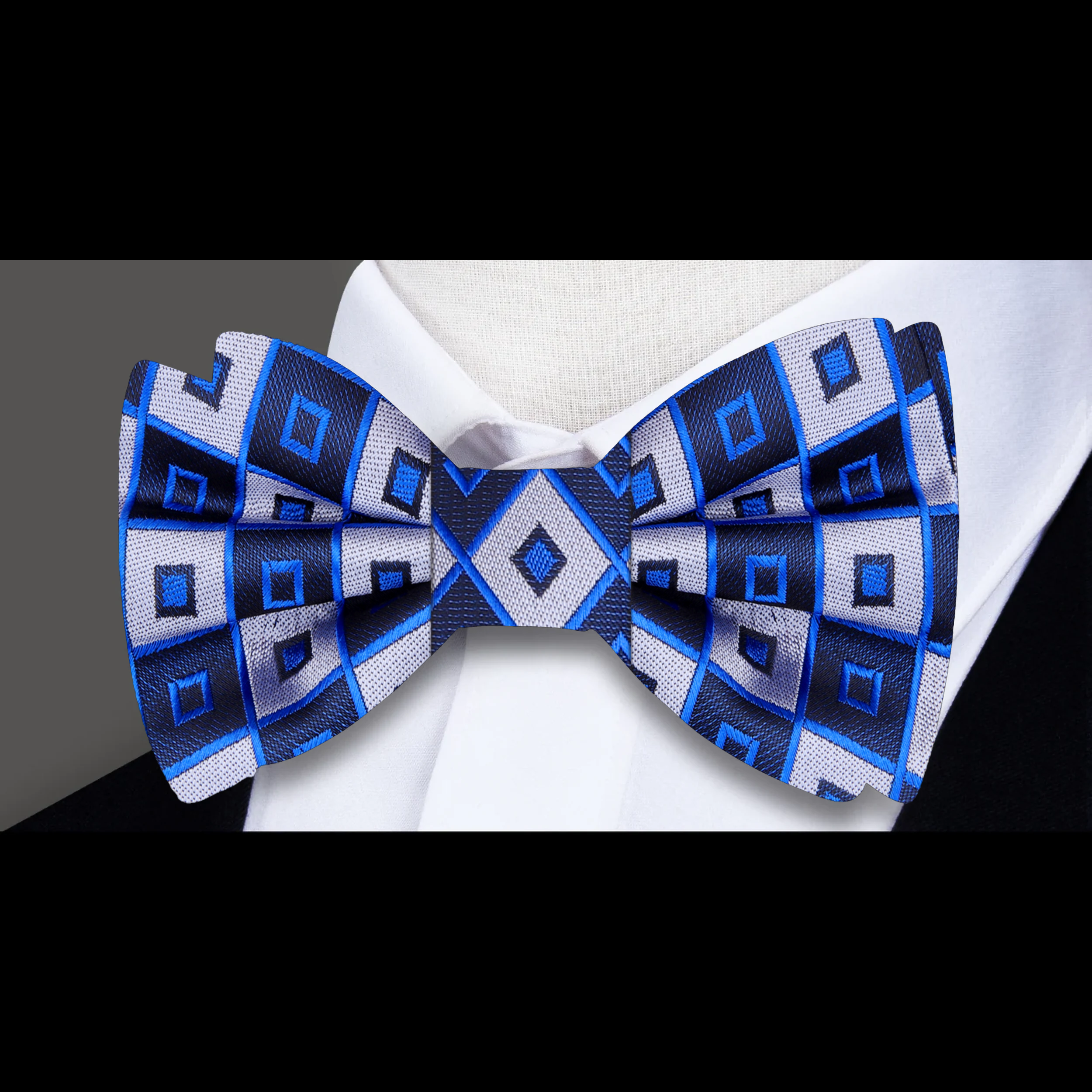 Close-up of the bow ties geometric pattern, highlighting the bold design and color contrast.