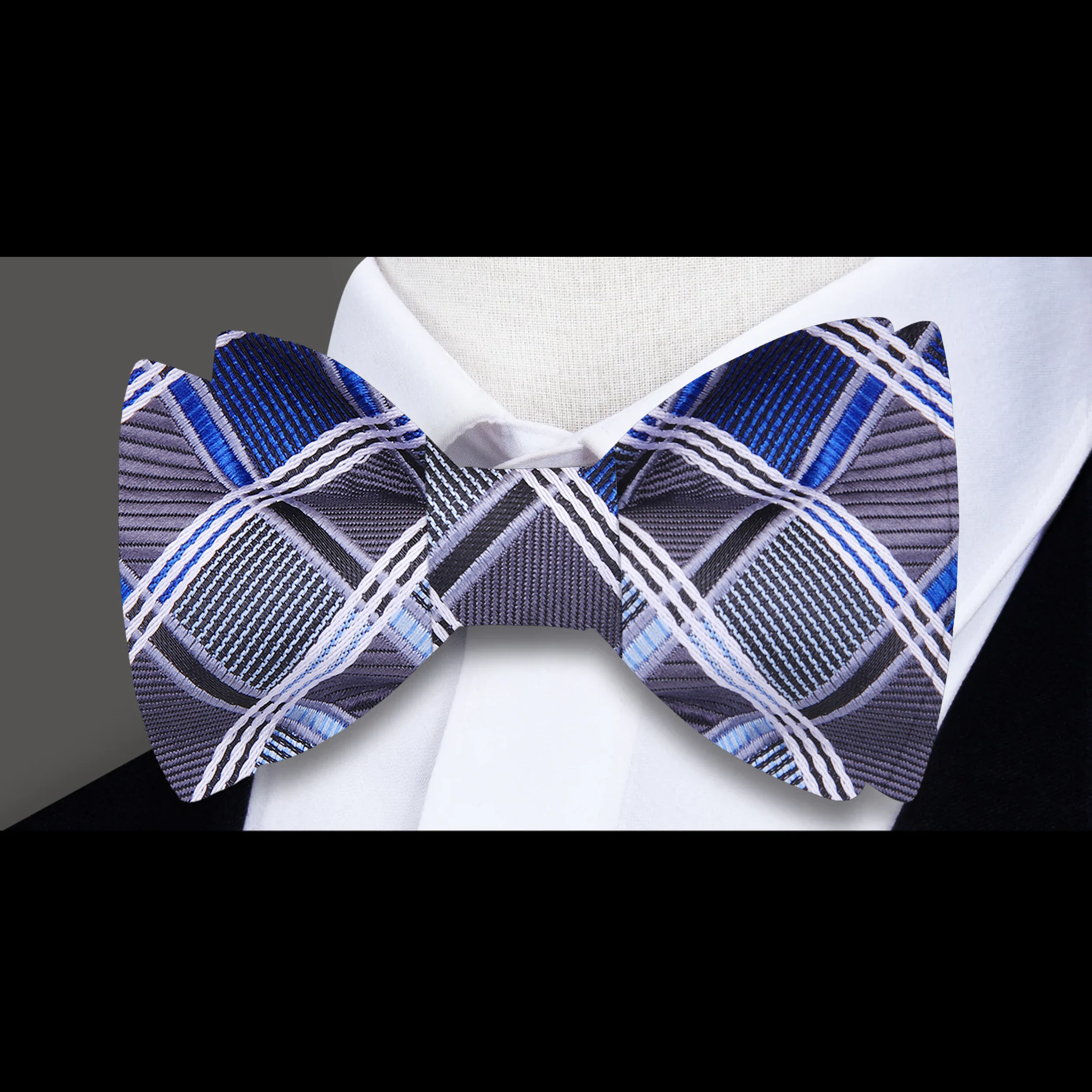 Styled with a white dress shirt and navy suit, ideal for weddings or cocktail parties