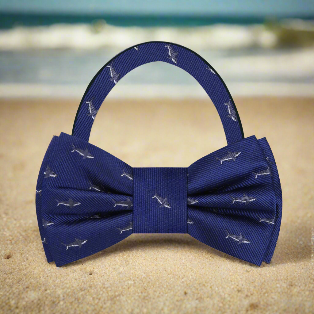 Close-up of the Great White Shark silk bow tie on a white shirt, emphasizing the intricate shark design.