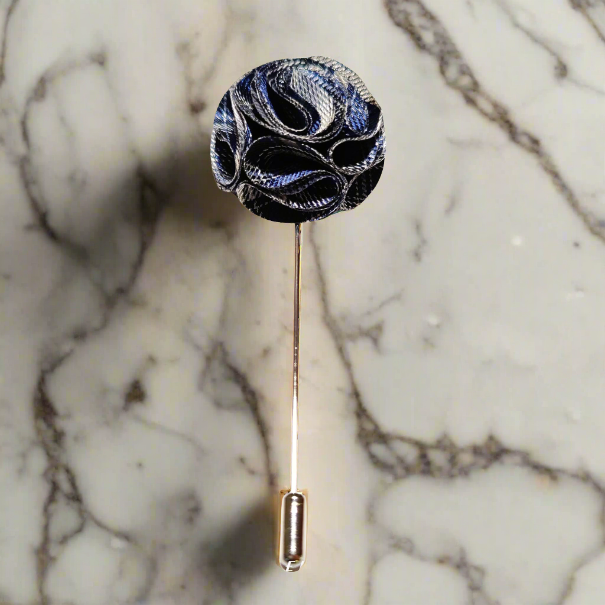 Mens lapel pin in vibrant blue fabric, perfect for weddings and formal events