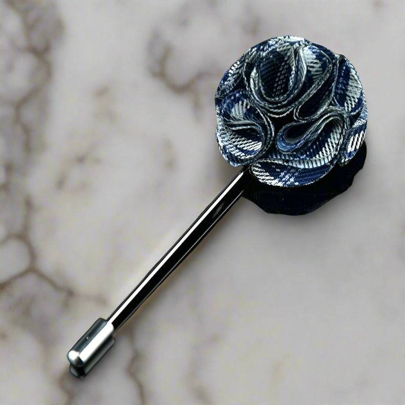 Close-up of a high-quality flower pin with textured fabric and zinc alloy backing