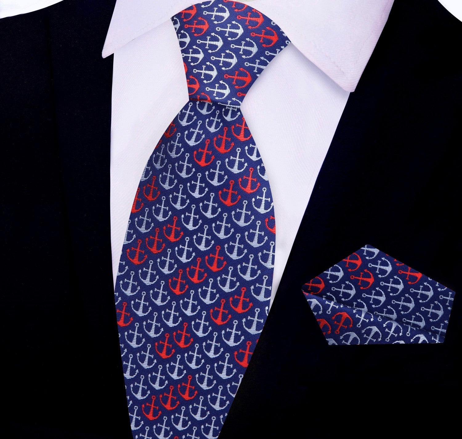 Anchor necktie in blue and grey paired with a light grey suit for business casual look