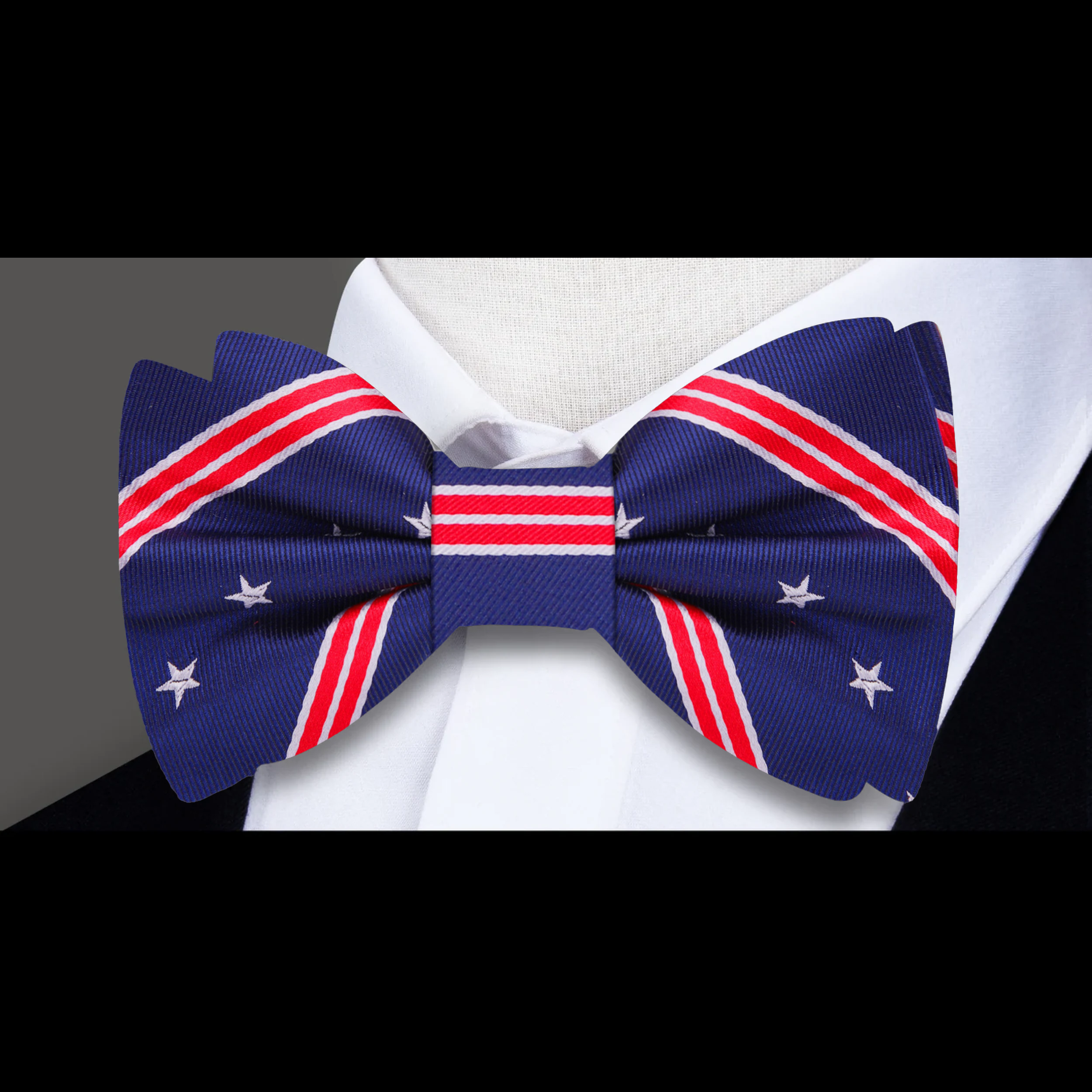 Close-up of a red, white, and blue silk bow tie for men