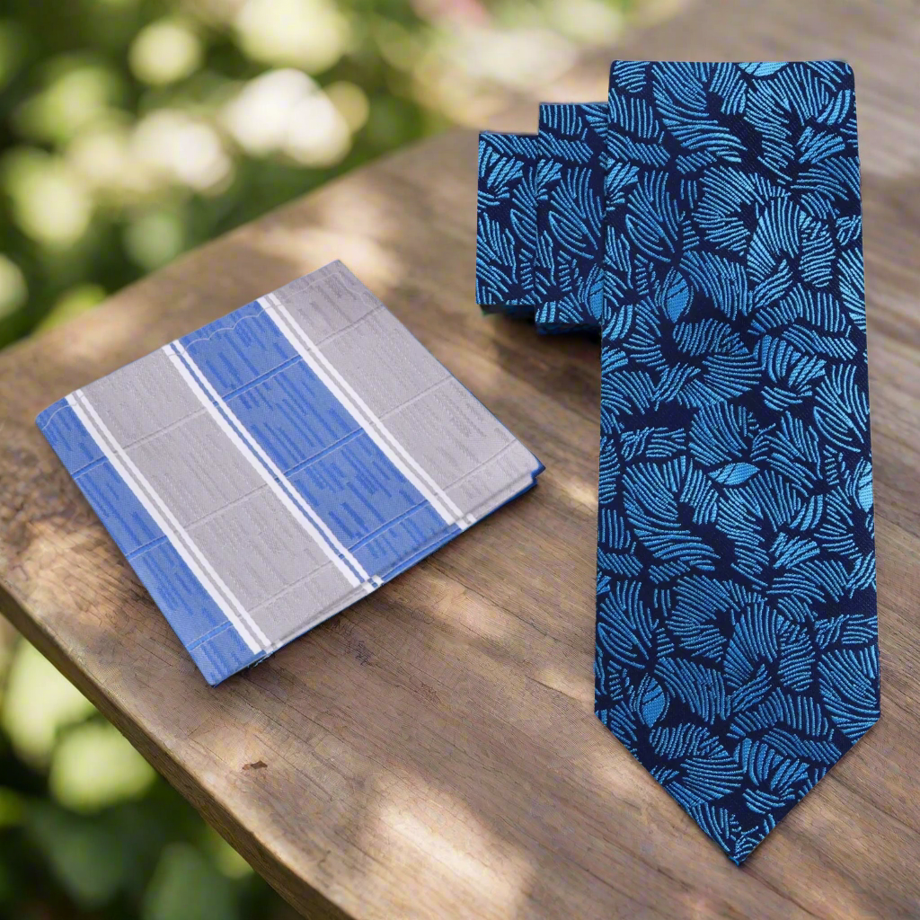 Light blue palm leaf tie for weddings with a navy suit