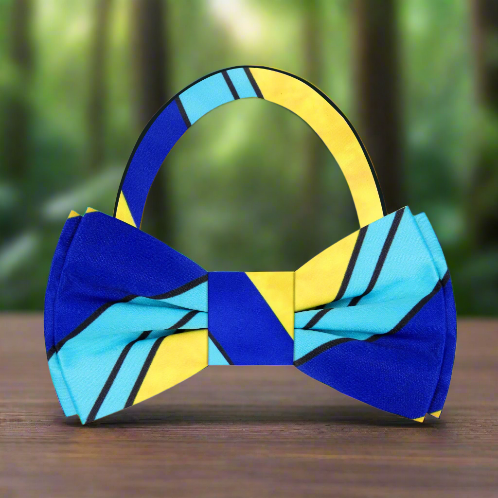 Close-up of the vibrant blue and yellow silk bow tie showcasing its bold stripe pattern.